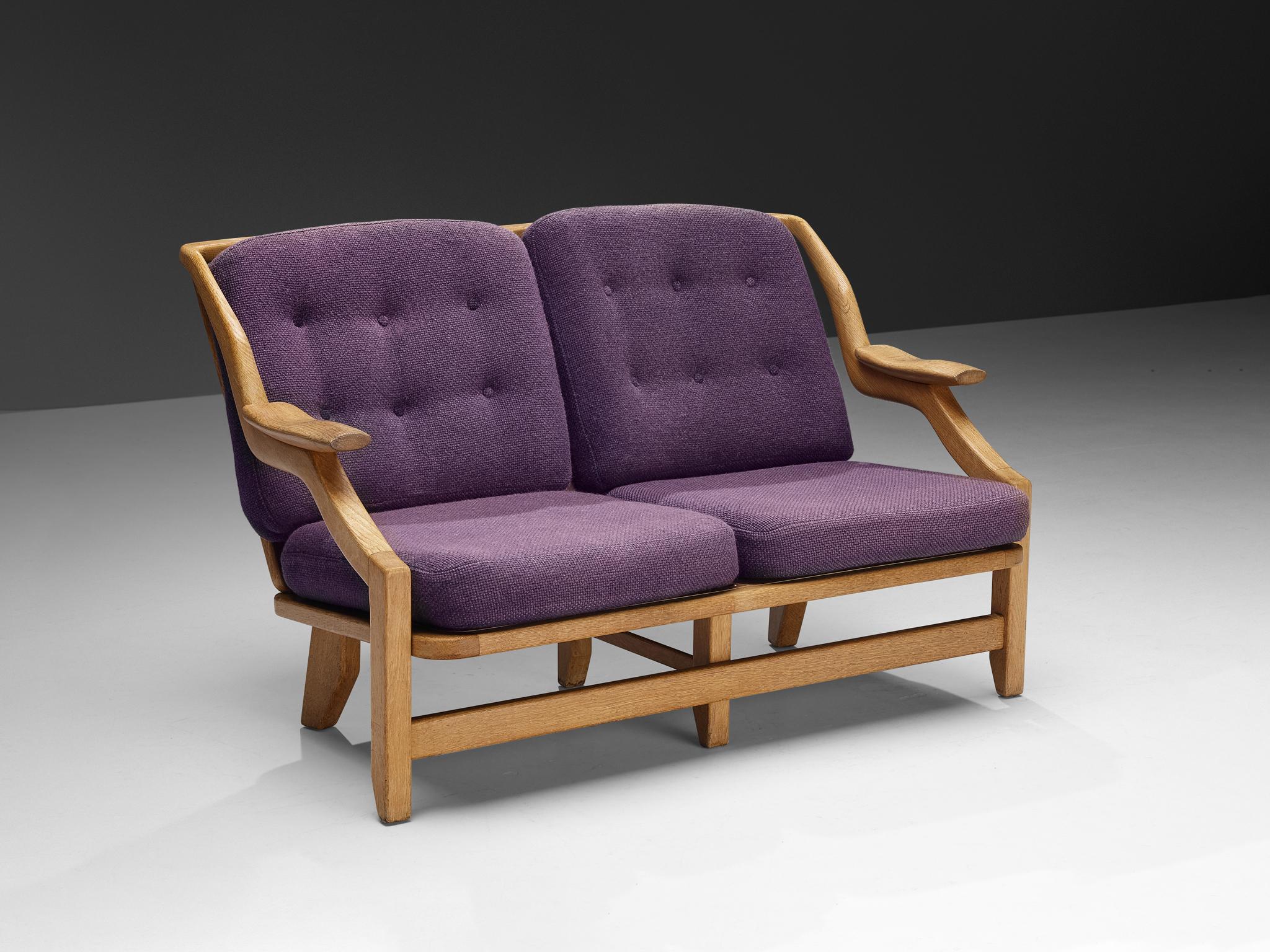 Guillerme & Chambron for Votre Maison, sofa, model 'Gregoire', fabric, oak, France, 1960s

The ‘Gregoire’ sofa is designed by the French designer duo Jacques Chambron and Robert Guillerme. The design features a stable construction featuring the