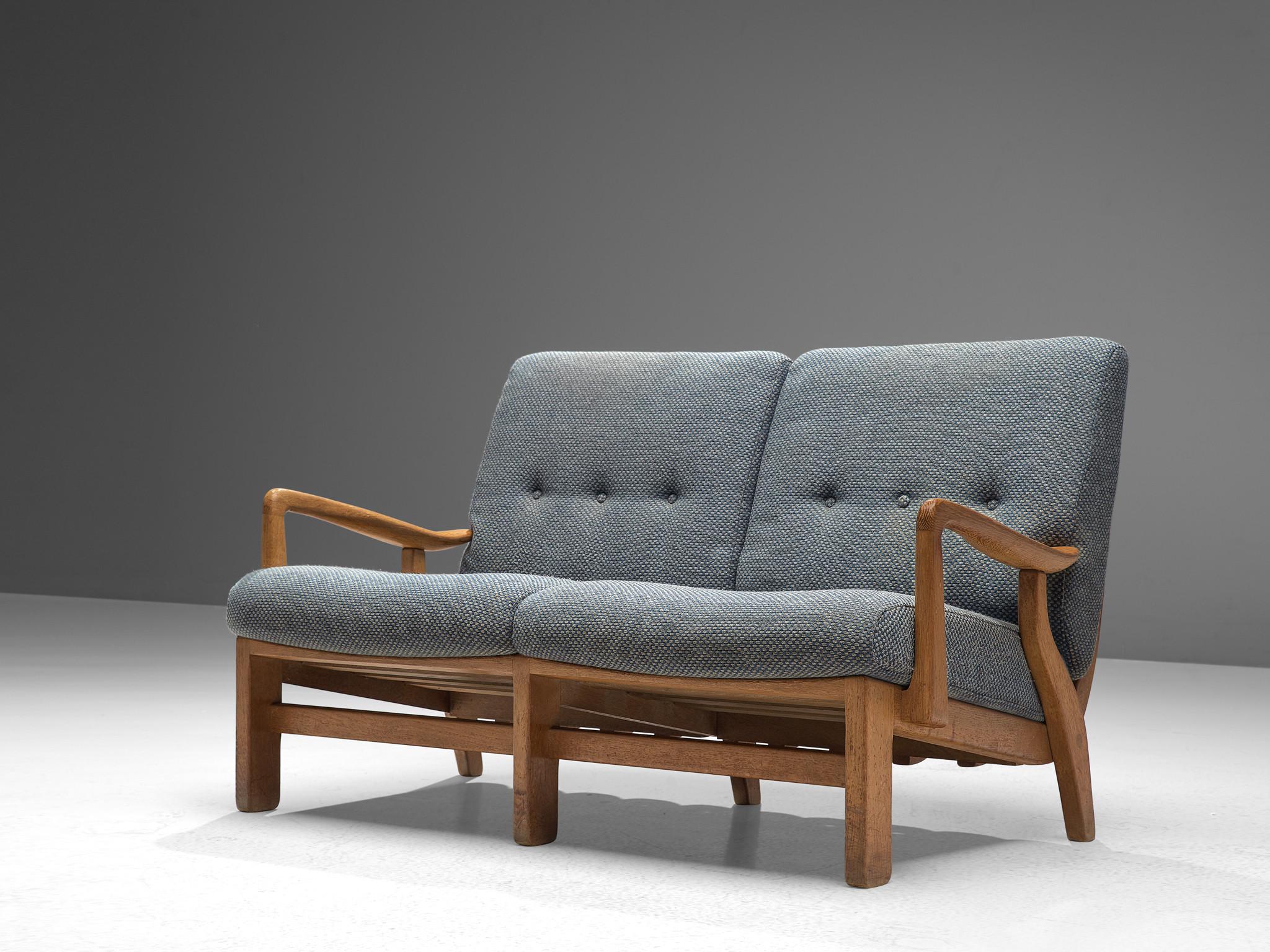 Guillerme & Chambron, sofa, oak, fabric, France, 1960s. 

Beautiful two-seat settee by Guillerme & Chambron, in solid oak. The back of the seat has been beautifully finished with wooden slats which adds an original and interesting character to the