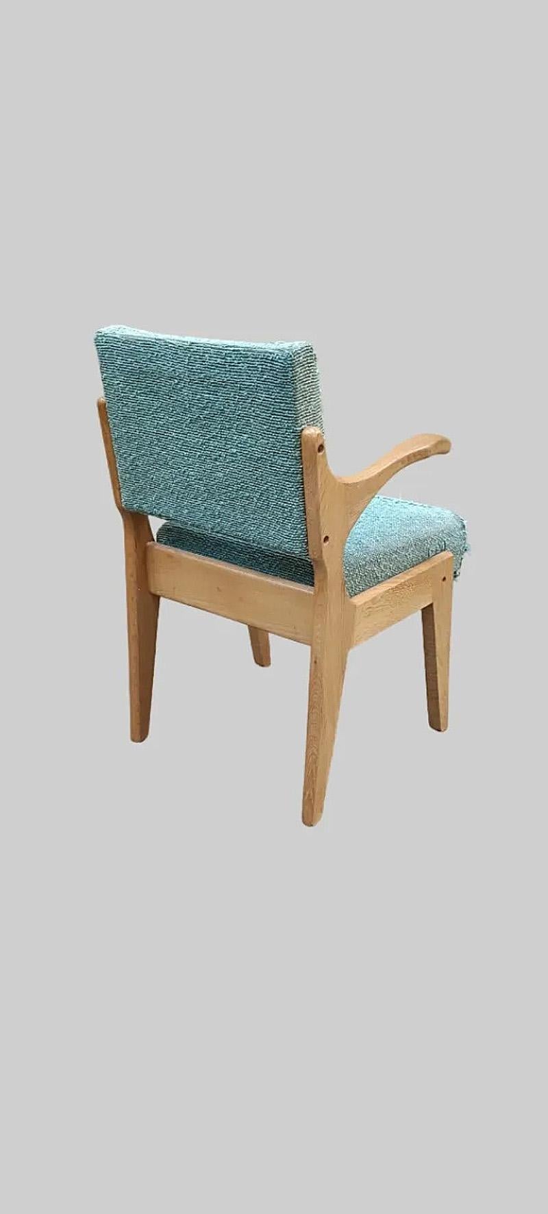 Guillerme et Chambron, 1960 oak armchair edited by Votre Maison.
modele 
