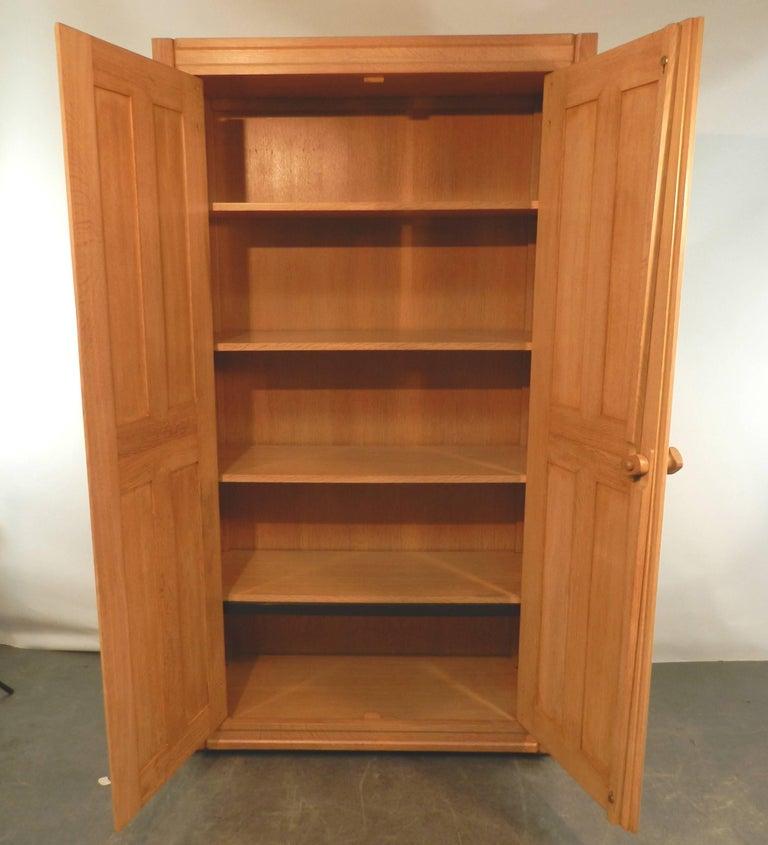 Guillerme et Chambron, 1970 oak dresser. Votre Maison Edition.

 Votre maison : a style, a concept, a mindset.

The Votre Maison story begins in 1940 in Prussia, near the Mazaurien Lake. A stalag, a wooden camp... Gathered by the absurd consequences