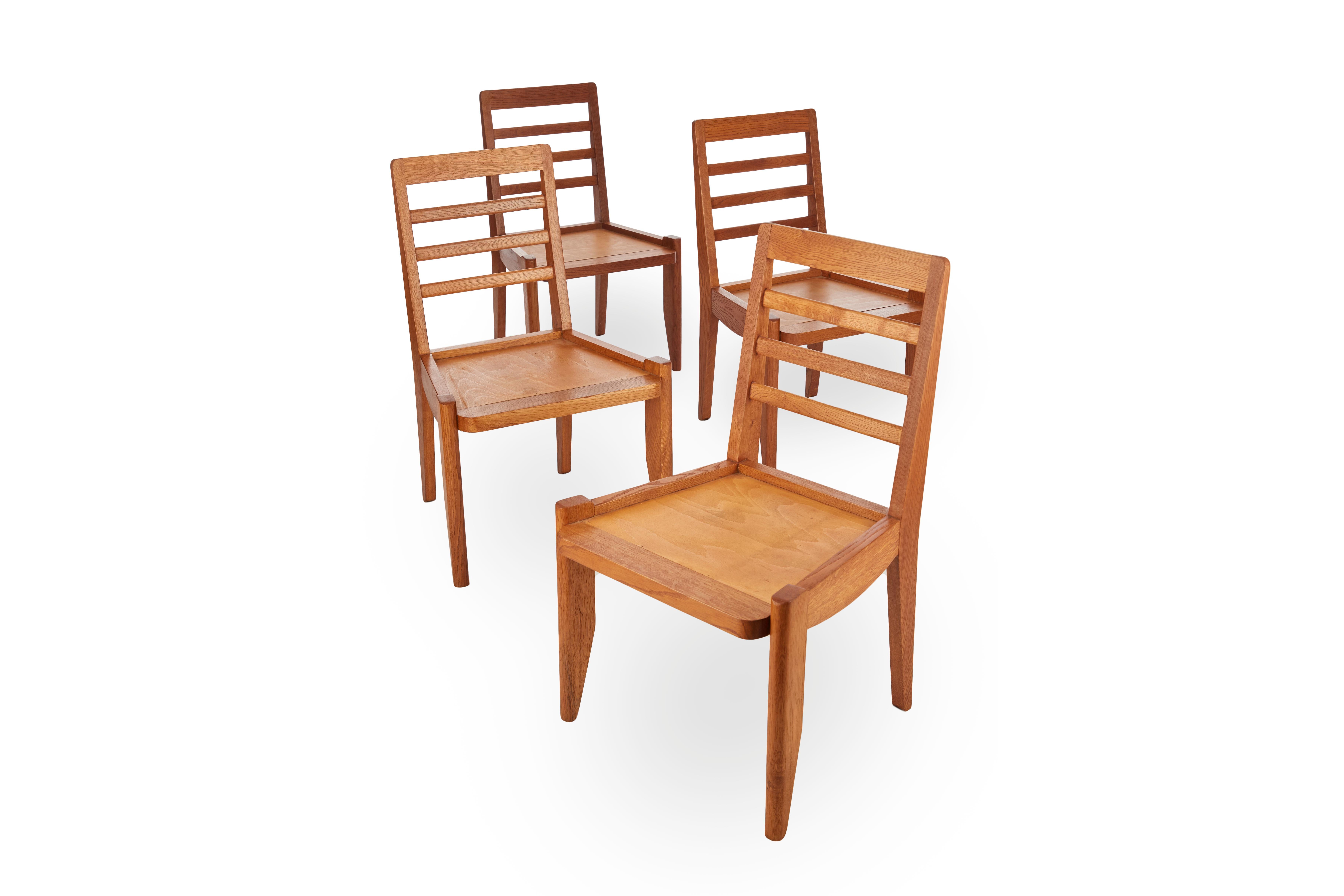 These elegant set of six polished oak dining chairs by the celebrated French designer Robert Guillerme, was created as part of a line of design he produced for the company Votre Maison.

Guillerme placed equal emphasis on function and aesthetics,