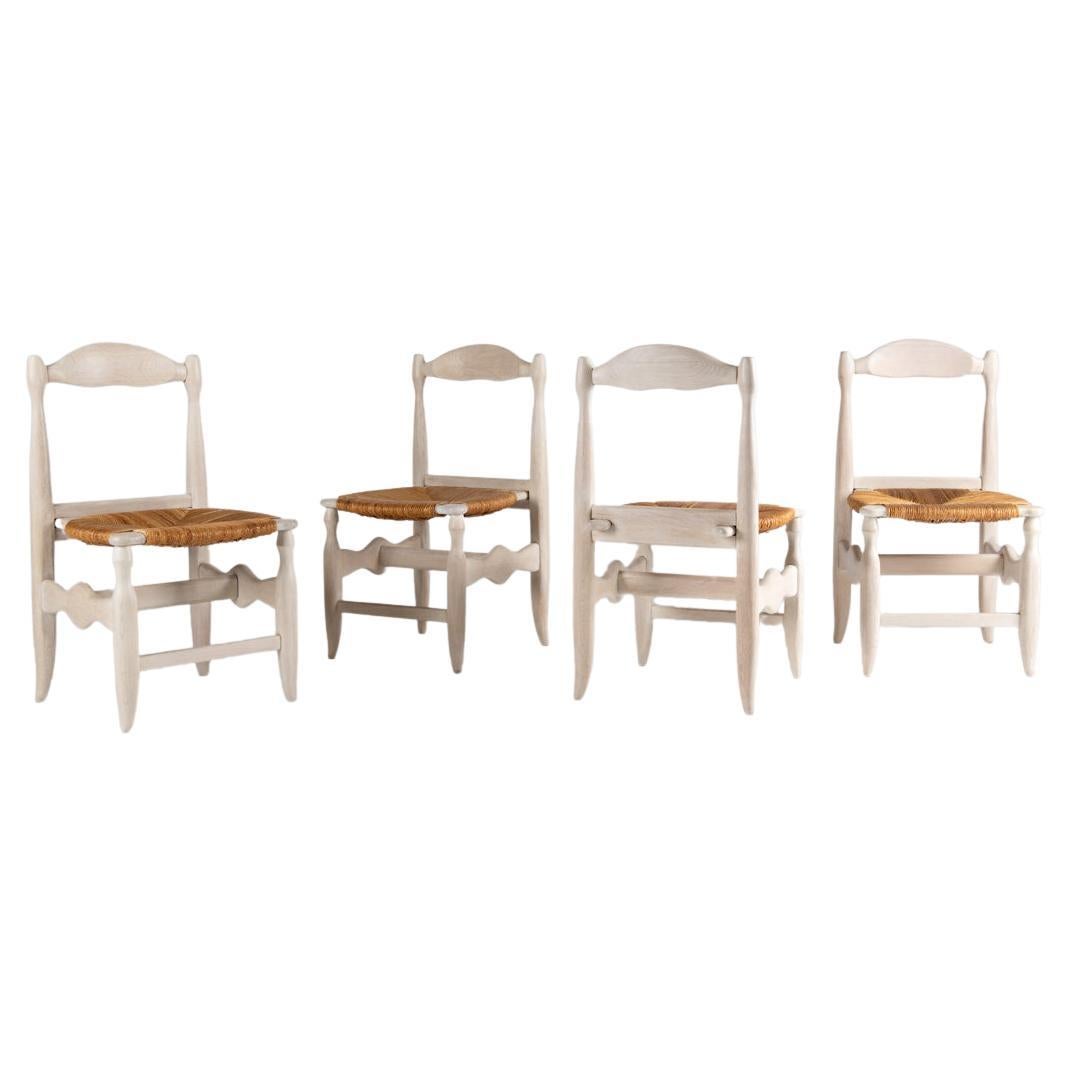 Guillerme et Chambron, 6 chaises de salle à manger en chêne poli, France, milieu du 20e siècle