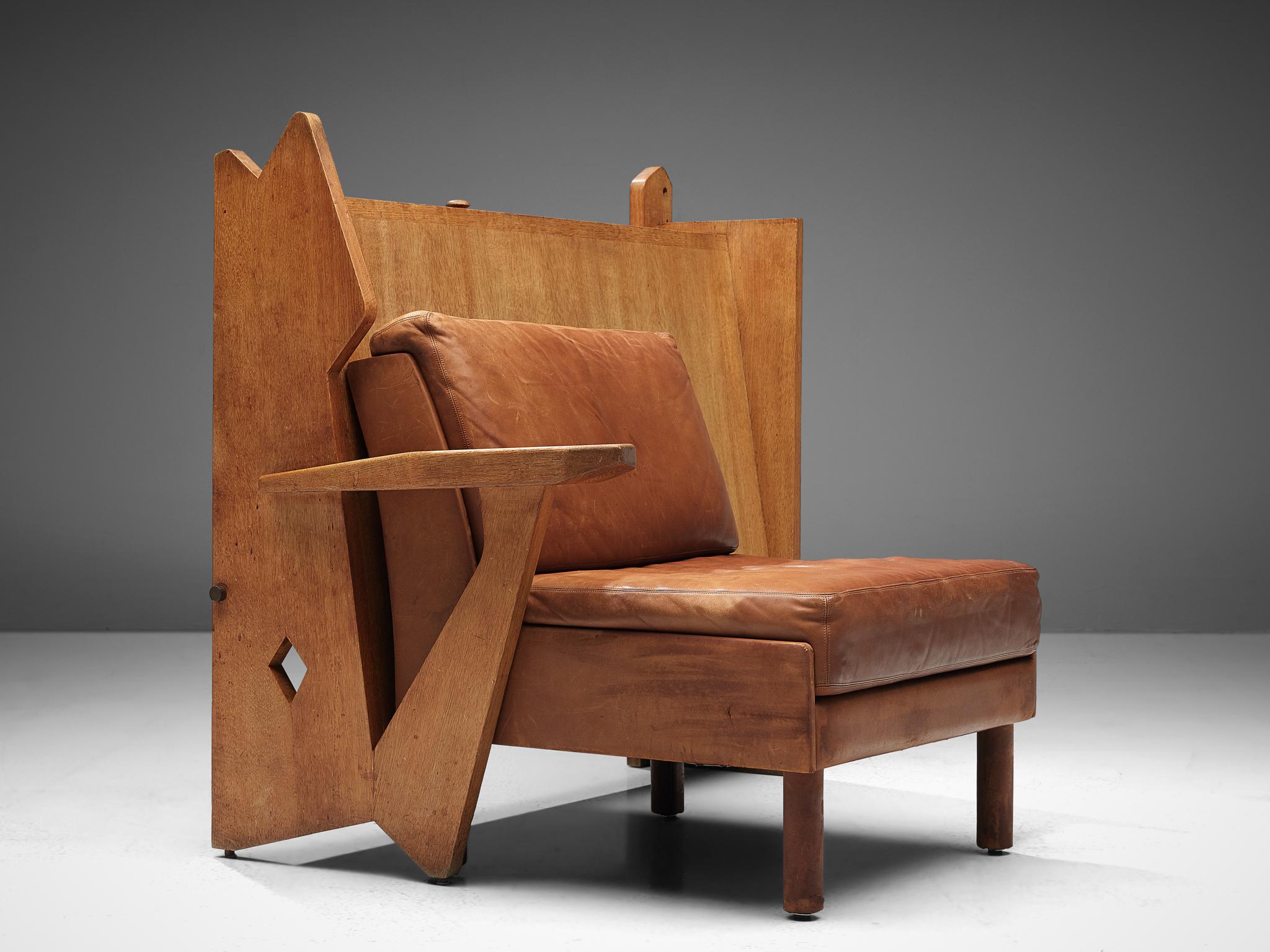 Guillerme et Chambron for Votre Maison, lounge chair and cabinet, oak, leather, France, 1960s

This is a remarkable piece of furniture by Guillerme et Chambron. The whole construction is based on a seating area and a unique, custom-made cabinet. The