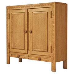Guillerme et Chambron Cabinet in Oak with Decorative Woodcarving