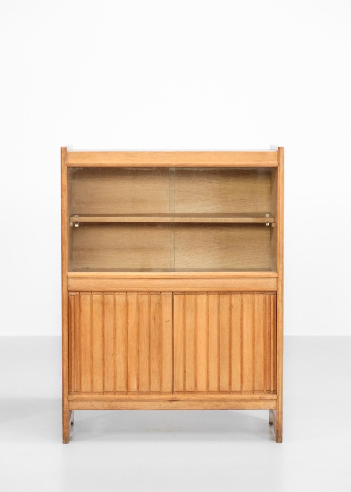 Rare set of two cabinets made in oak.
Designed by Guillerme et Chambron for Votre Maison.