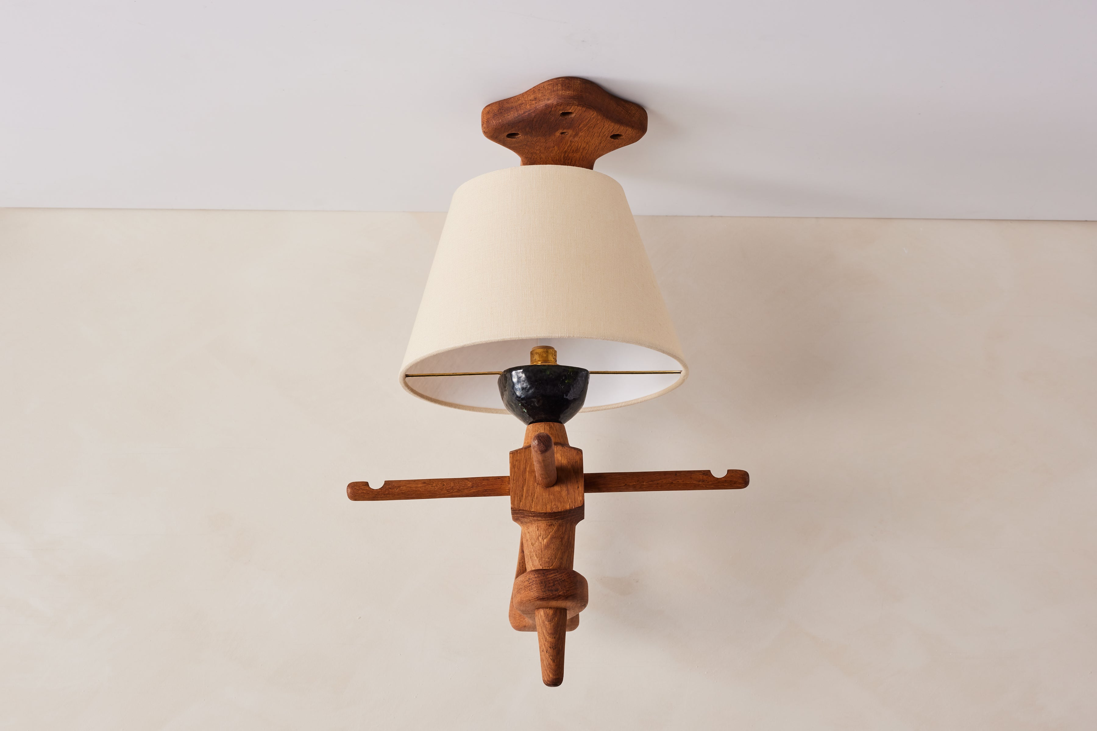 Rare ceiling light by Guillerme et Chambron- Large in Scale

France, 1940's. 

Beautiful hand painted ceramic sockets with signature oak frame and new single linen shade. 

Rewired.
