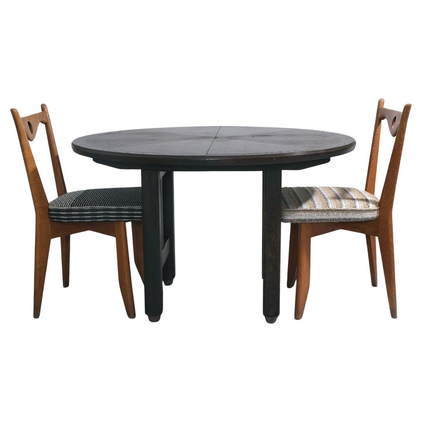 Guillerme et Chambron Table de salle à manger à rallonge à plateau circulaire en vente