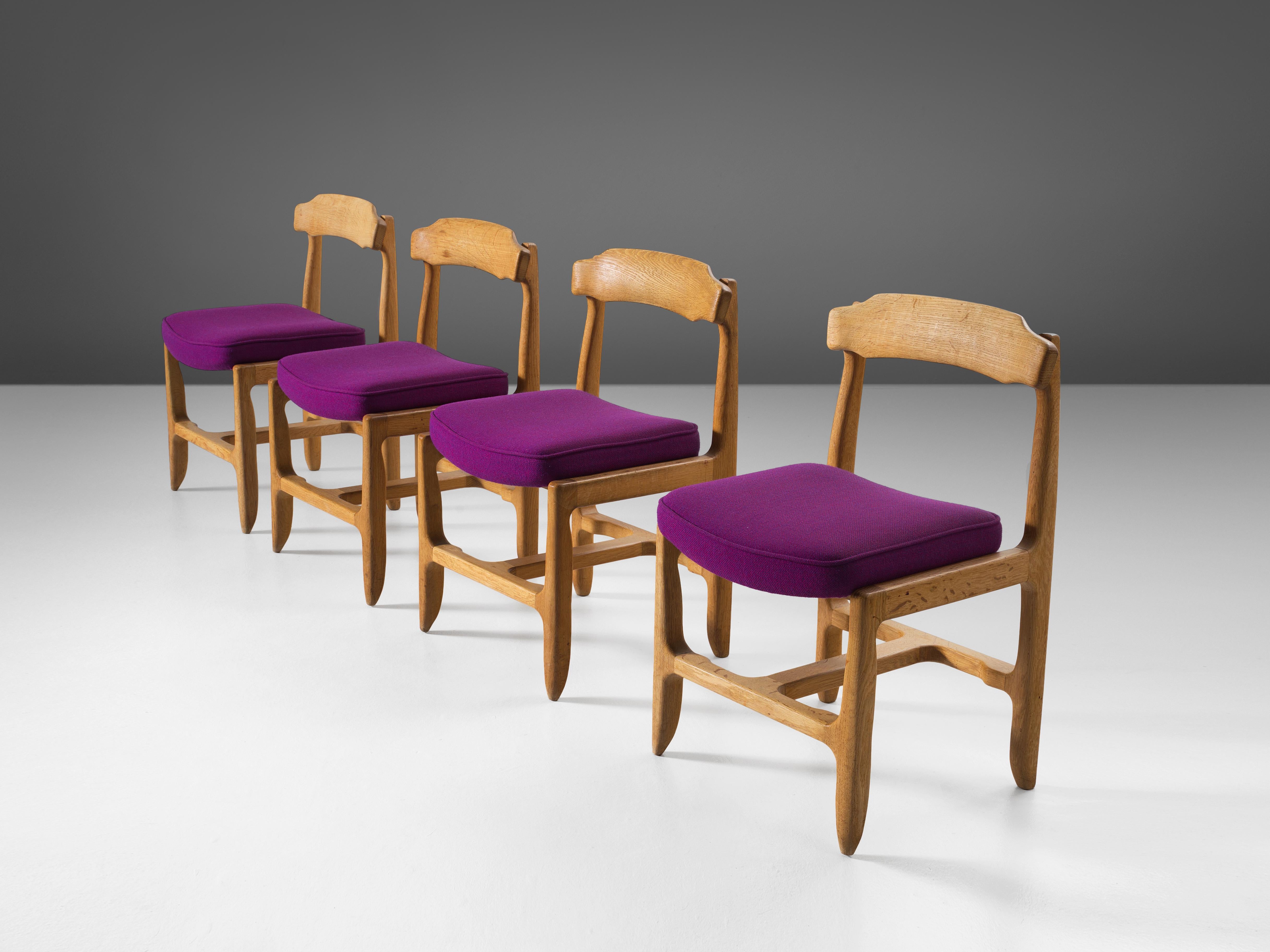 Guillerme et Chambron for Votre Maison, set of four dining chairs, fabric, oak, France, 1960s 

These distinctive chairs in beautifully patinated oak are by the French designer duo Jacques Chambron (1914-2001) and Robert Guillerme (1913-1990). This