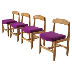Guillerme & Chambron Set of Four Dining Chairs in Oak and Purple Upholstery 