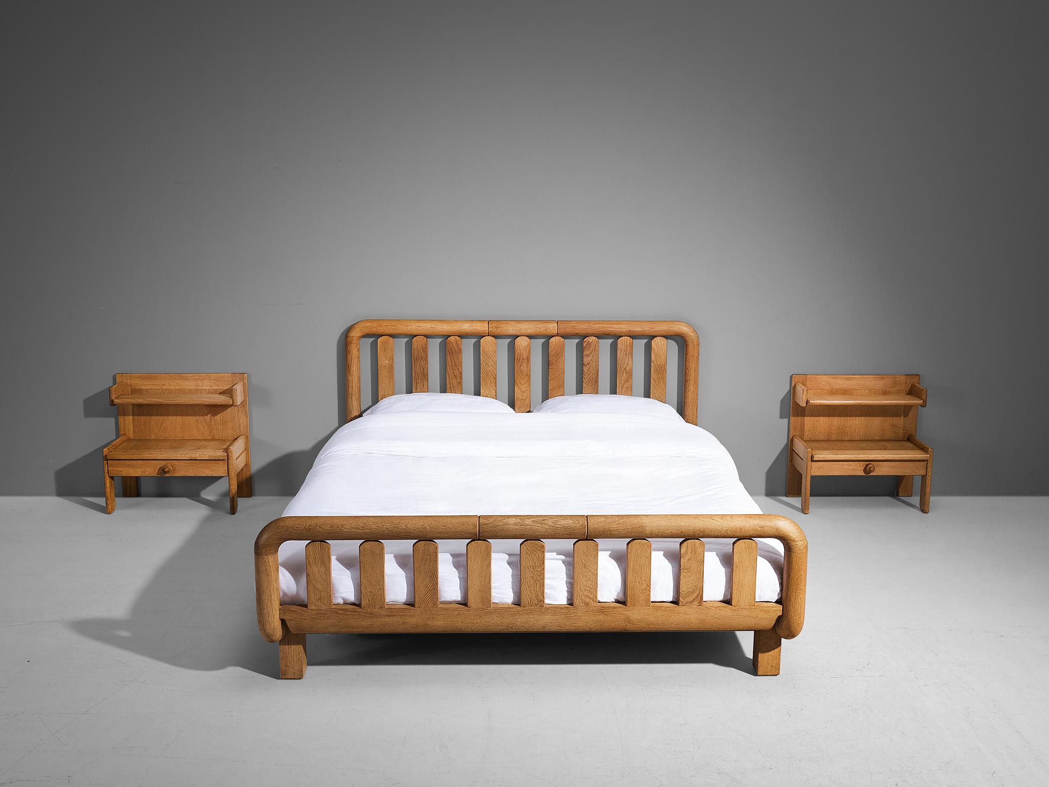 Guillerme et Chambron, double bed, oak, France, 1960s

This bed's main feature is obvious: It's all about the wood work. The excellent crafted frame executed in solid oak has stunning geometrical detailing on the slats, which gives it a very
