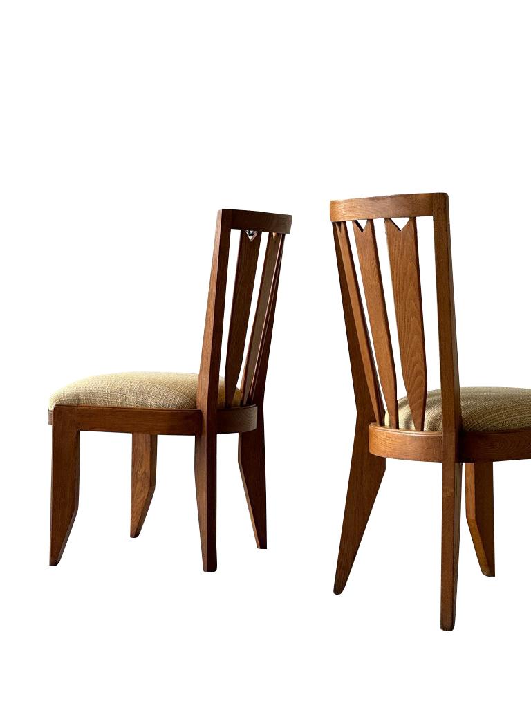 1960's French Guillerme et Chambron exceptional set of eight dining chairs.
Rare design.
Newly restored and seat has been recently reupholstered.
Oak.
Also available as a set of six (S3045) and as a single chair (S3046)
Arriving april.