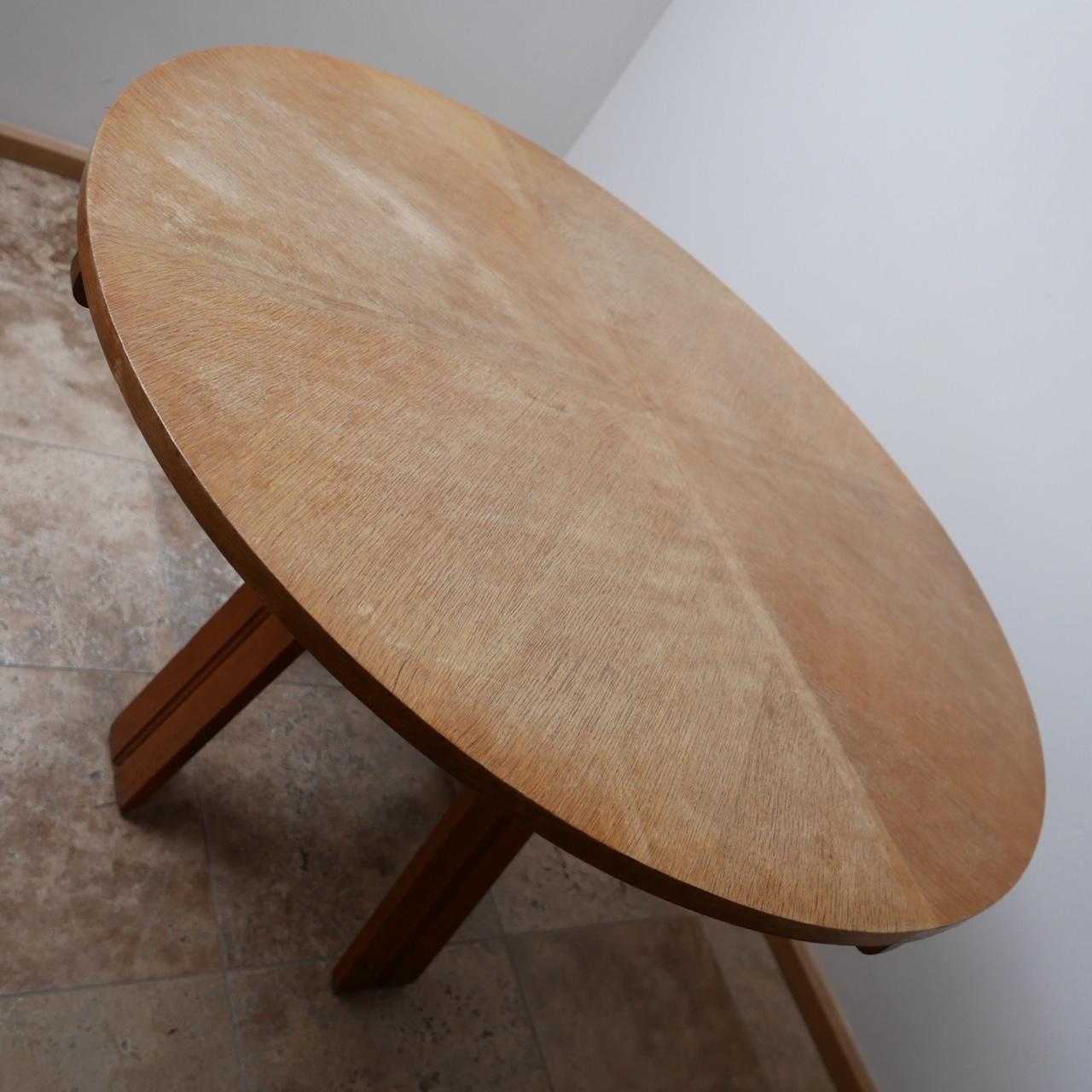 A circular dining table by French design legends Guillerme et Chambron.

A good size for a smaller room or flat. The legs of the table are removable for transport. 

Oak, circa 1960s.

Some wear to the top (see photos) but otherwise good solid