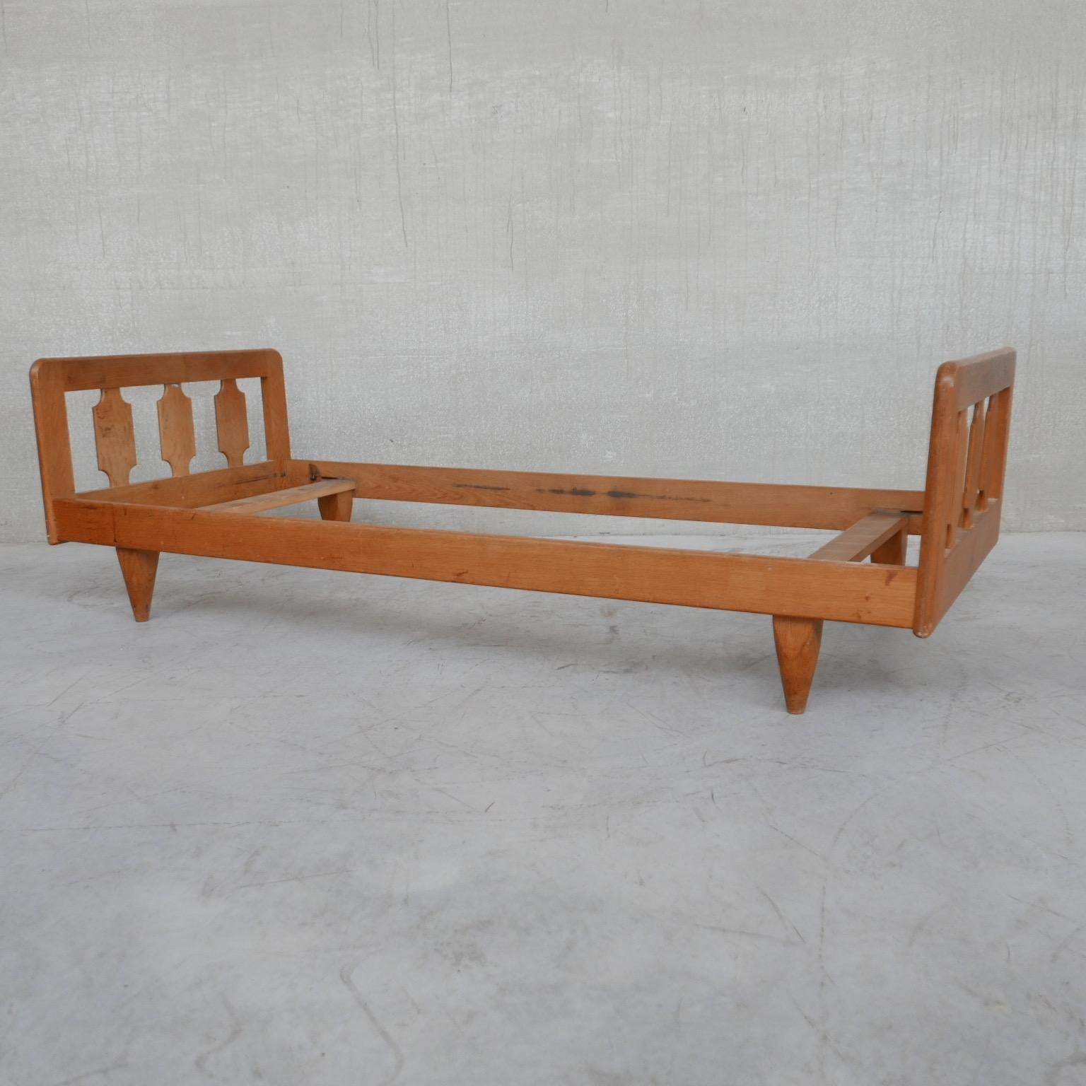 A day bed by Guillerme et Chambron. 

France, circa 1960s. 

Oak, will be provided with slats and a mattress which can be upholstered. 

Ideal as a day bed or a single bed. 

Good condition, wear commensurate with age, it can be restored by
