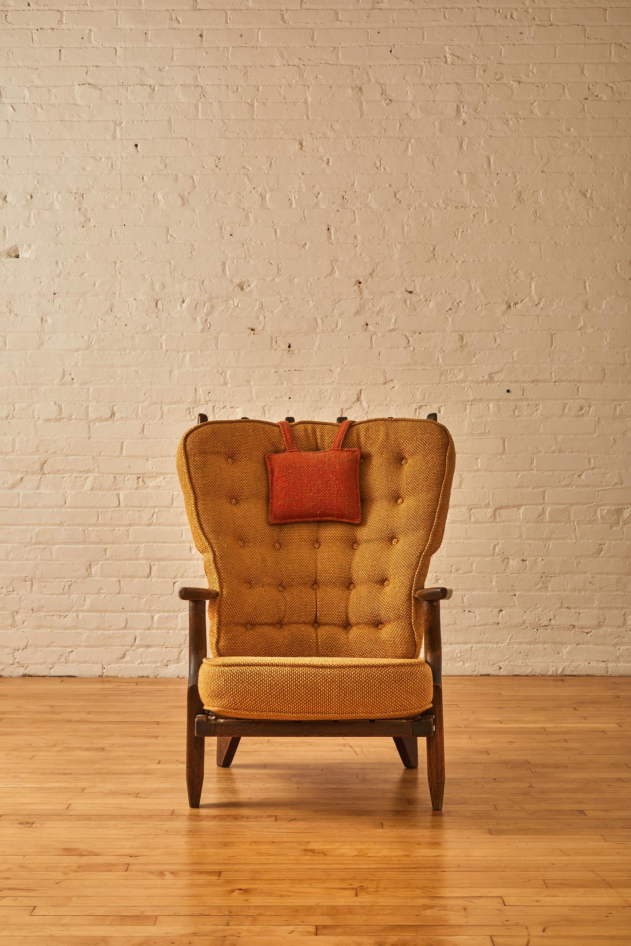 Guillerme et Chambron grand repos armchair with oak frame. 

  
