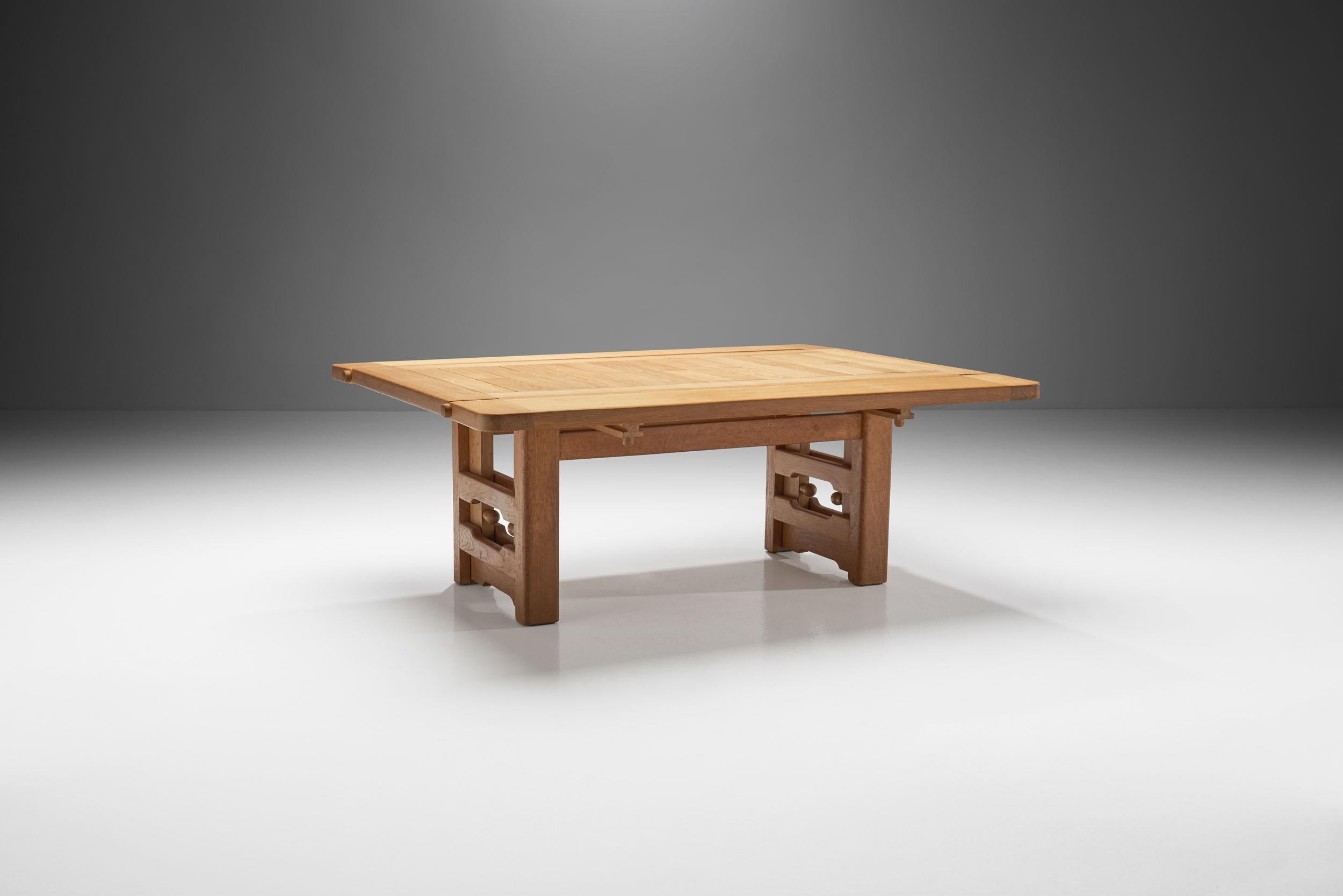 Solid oak “Sébastien” table by French designers Guillerme et Chambron, by Votre Maison France. This modular model is adjustable in height and width as well. Thanks to its creative design, this table can be adjusted to be a coffee, desk or dining