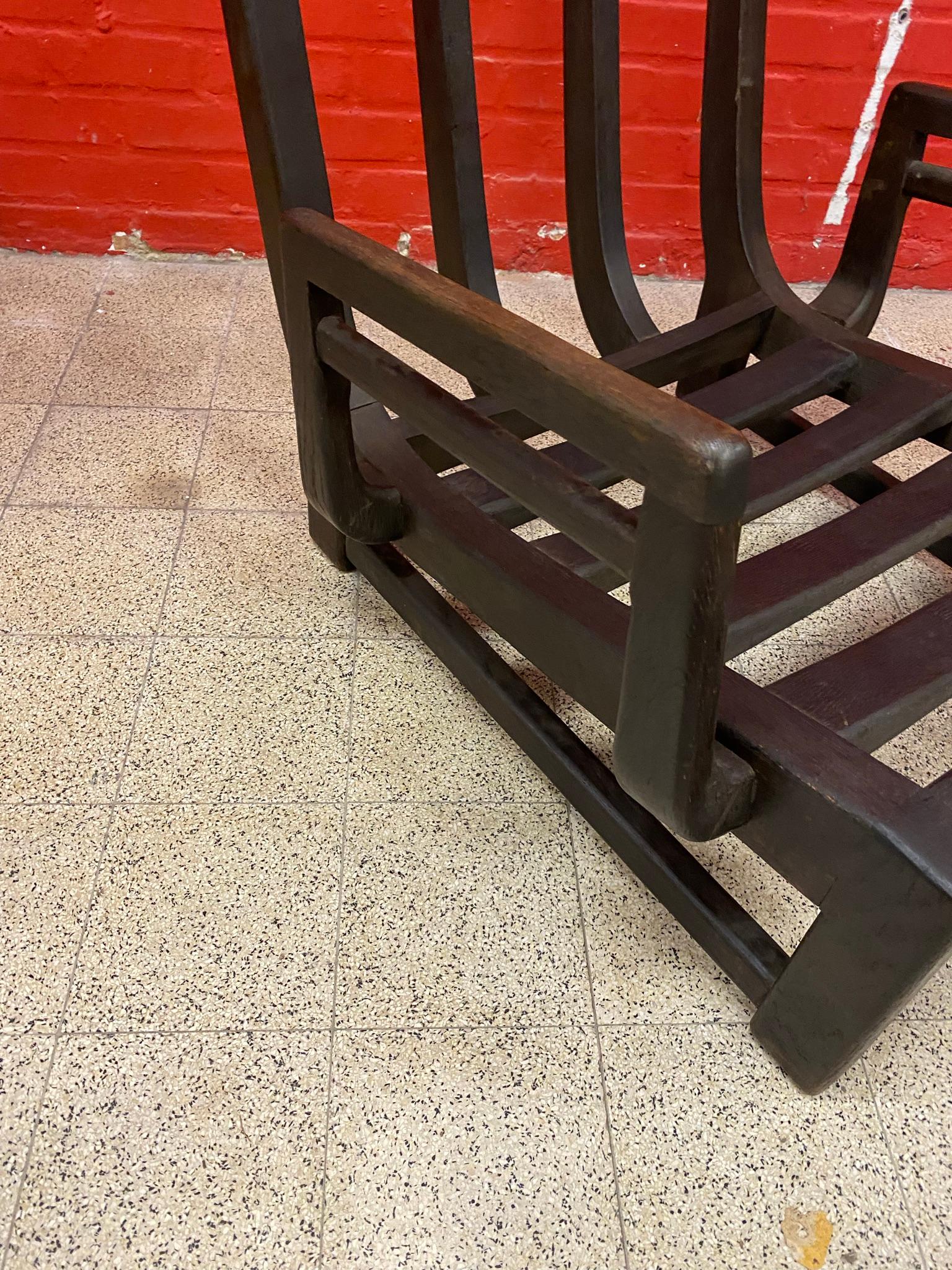 Un sillón de roble negro de Guillerme et Chambron.
Edición Votre Maison hacia 1970.