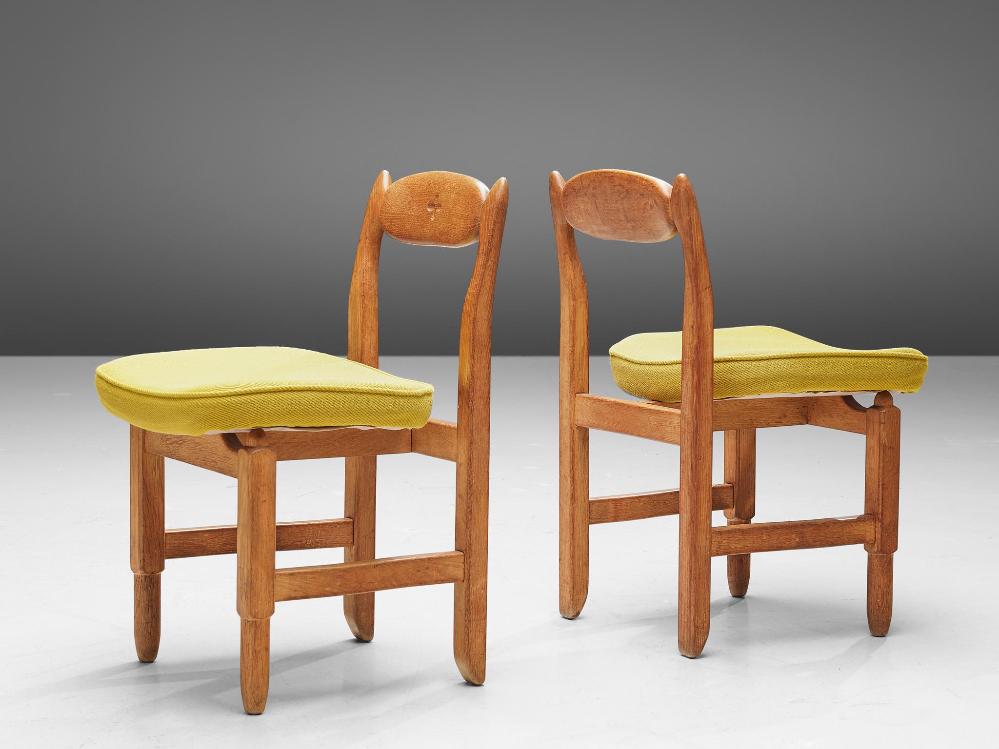 Guillerme et Chambron, dining chairs, fabric, solid oak, France, 1960s

These distinctive chairs in oak are designed by the French designer duo Jacques Chambron and Robert Guillerme. This dining chair shows organic and robust lines. Starting with