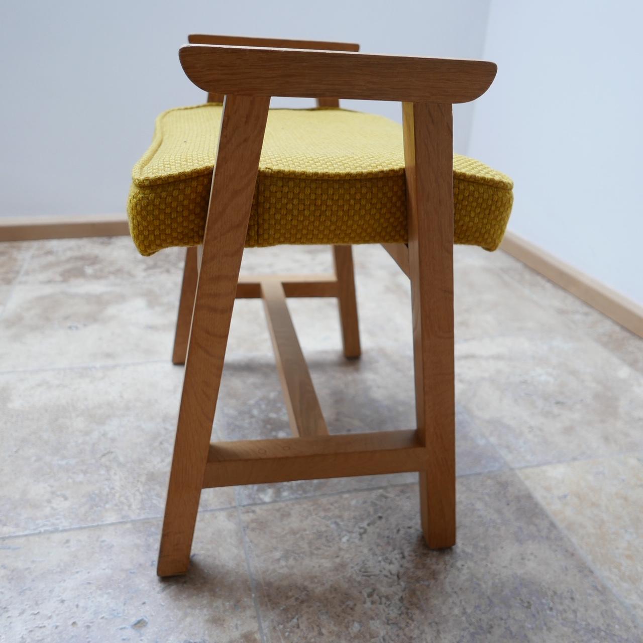 A well formed rare tabouret/stool by French design legends Guillerme et Chambron. 

Blonde oak, circa 1960s.

Original upholstery, perfectly usable but can do with updating. We can arrange for this to be done if needed. 

Dimensions: 37 D x 52