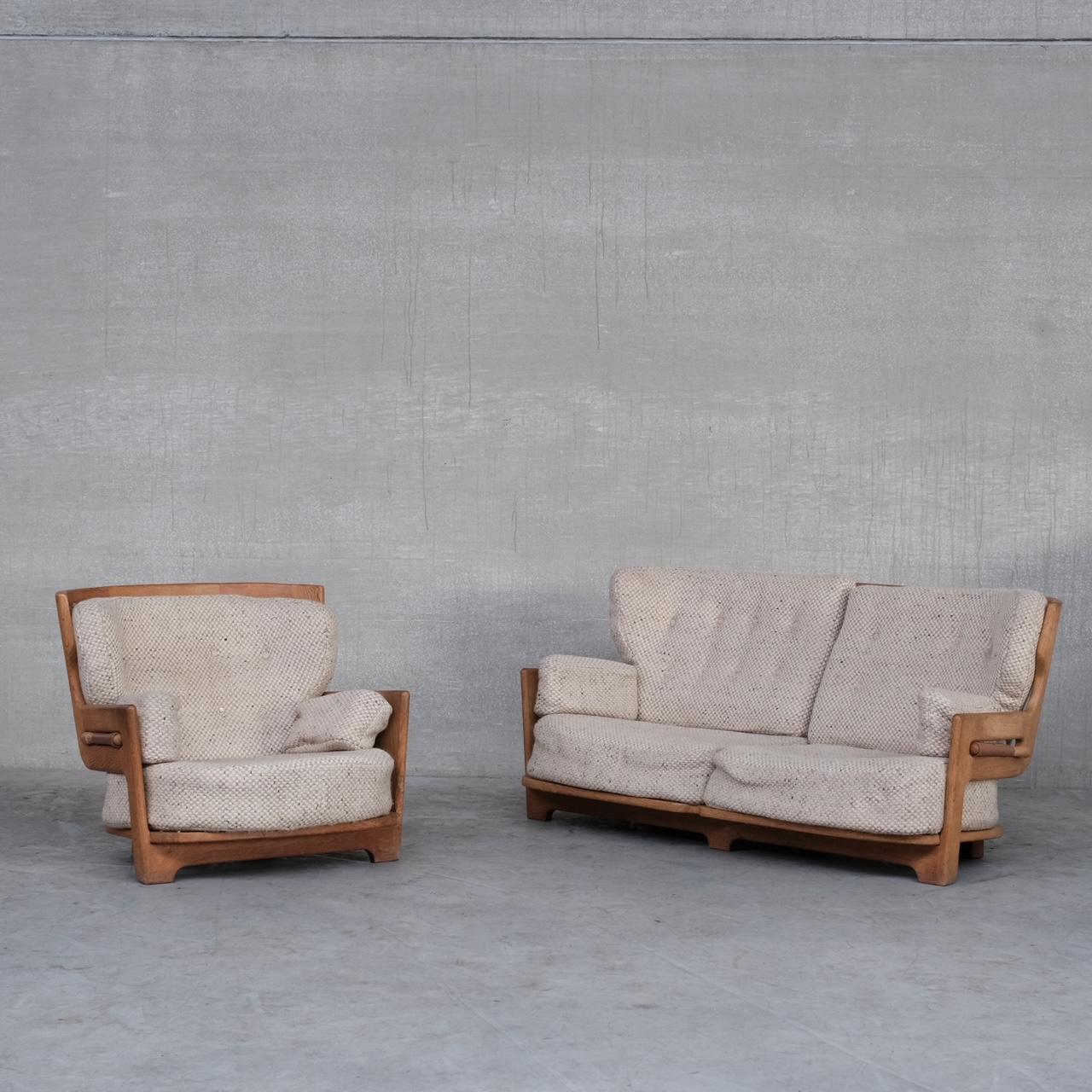 An increasingly scarce sofa and armchair set by French design legends, Guillerme et Chambron. 

France, c1960s. 

'Denis' Model. 

These look amazing upholstered in shearling, the fabric is original but wants updating, priced
