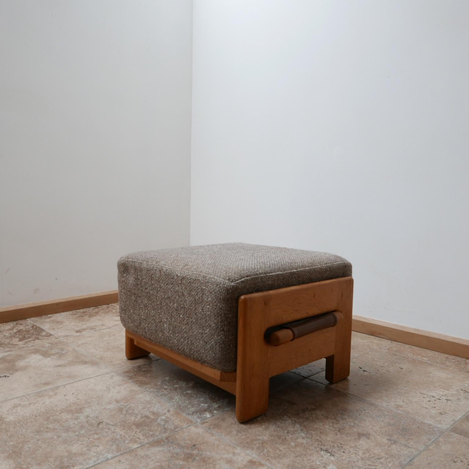 A rare Guillerme et Chambron footstool. 

Oak, upholstery and leather. 

Scarce Denis model. 

Upholstery is usable and the original but wants updating or replacing. We can arrange that to be done at cost. 

   

Dimensions: 36 H x 56 W x