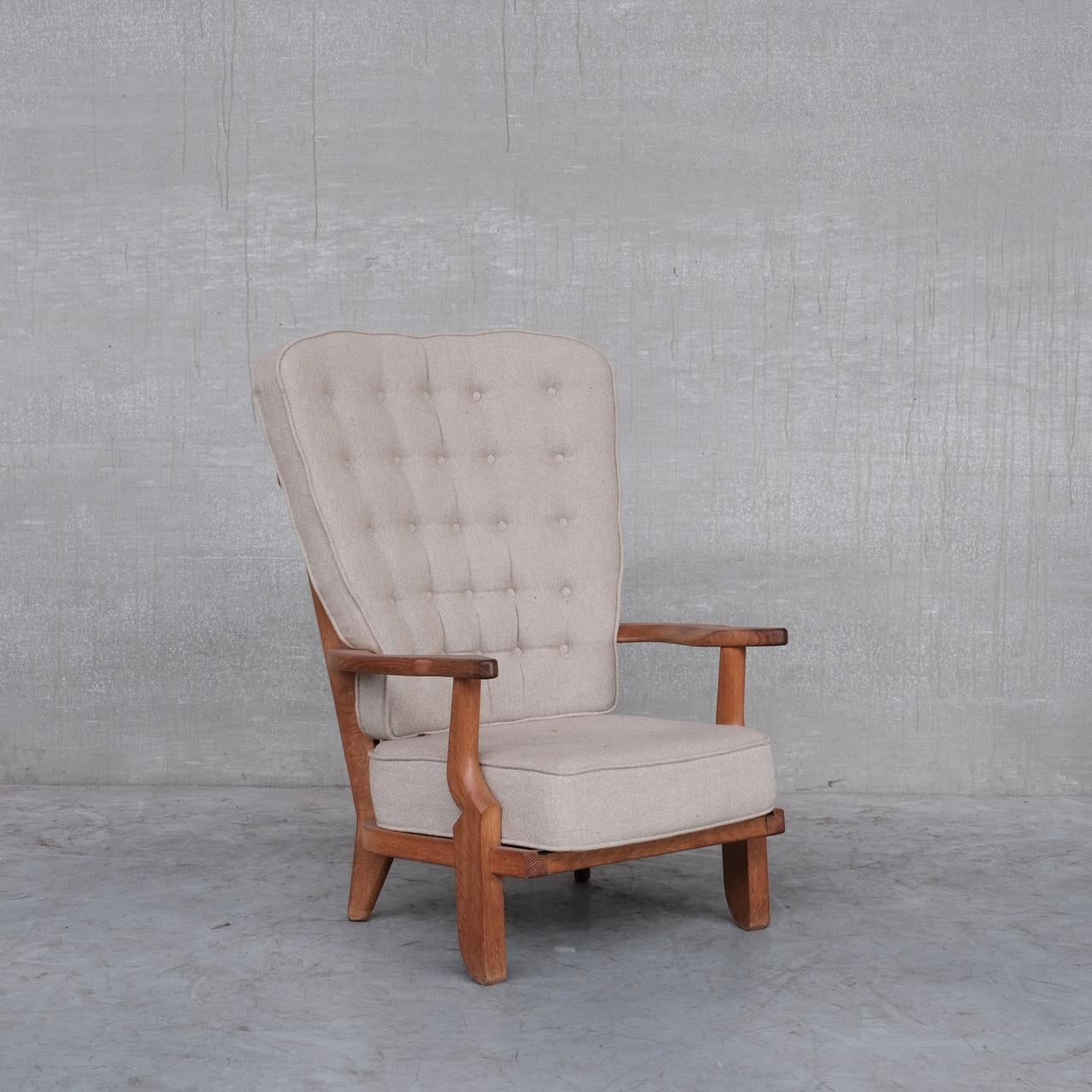 A large open armchair by Guillerme et Chambron. 

France, c1960s.

Solid oak frame, original upholstery retained which either needs cleaning or updating, priced accordingly. These look great with circular cushion back rests. 

Good