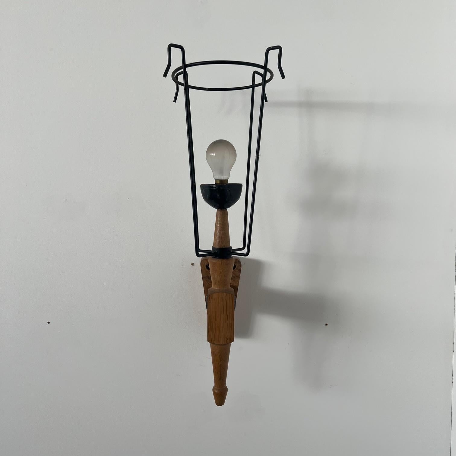 A single oak and ceramic wall light. 

France, c1960s. 

By designers Guillerme et Chambron. 

Original ceramic bulb holder cap retained, the shade holder has been left on but a shade would need to be created or we could remove the shade holder.