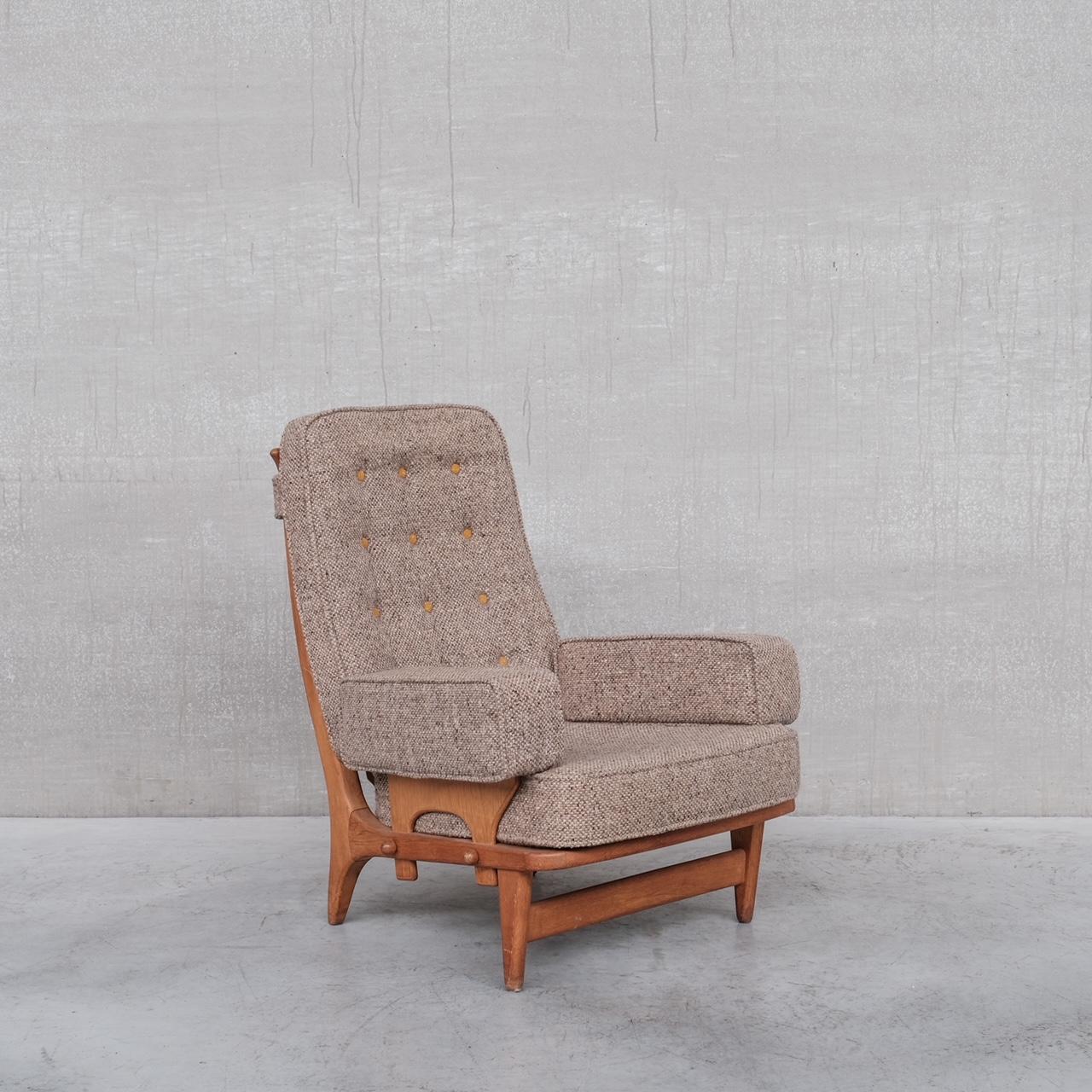 A rare mid 20th upholstered armchair by design legends Guillerme et Chambron. 

France, c1960s. 

Single armchair. 

Oak framed with original upholstery. 

A rare model we have not managed to have before. 

The upholstery remains in
