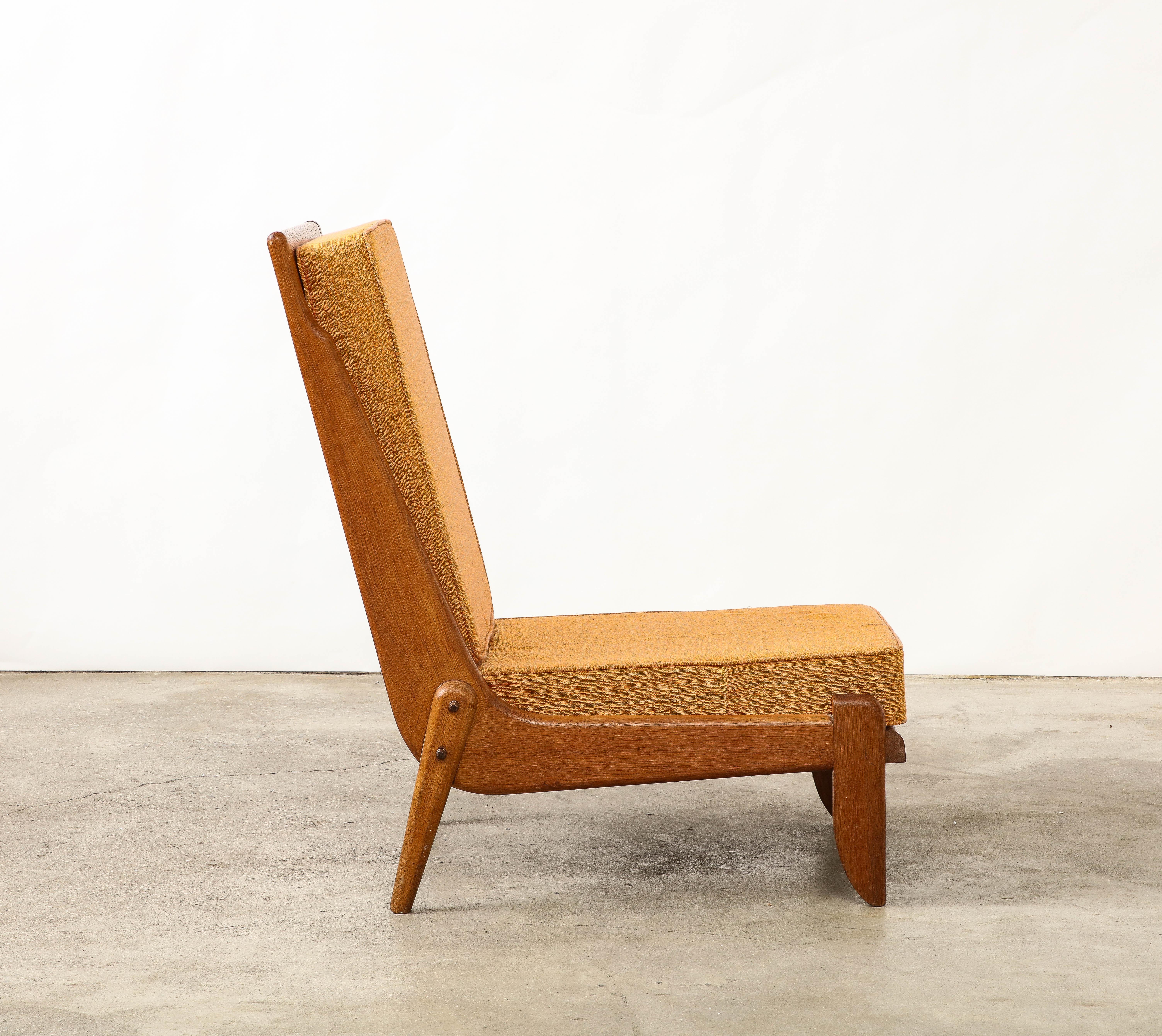 Mid-Century Modern Guillerme et Chambron Oak Lounge Chair with Sculptural Legs, France, c. 1960 For Sale