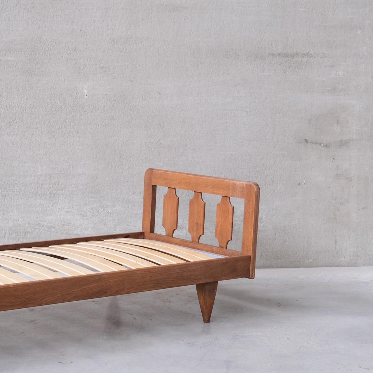 A Guillerme et Chambron day bed,

France, circa 1960s.

Oak.

No mattress or cushion was retained, this can be used as a day bed or single bed.

Location: Belgium Gallery.

Dimensions: 200 W x 86 D x 60 H in cm.

Delivery: POA

 