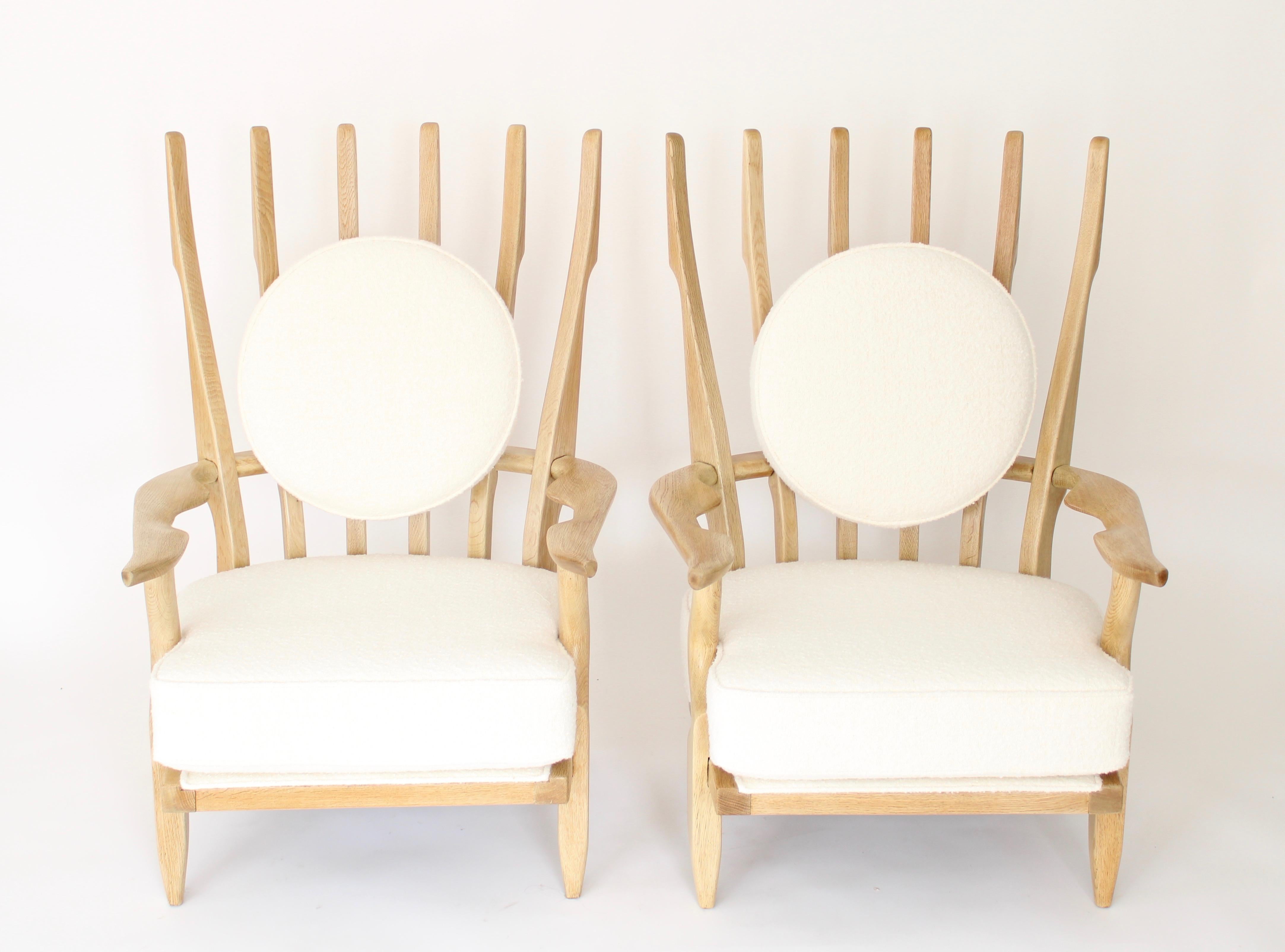 Gullerme et Chambron or Guillerme and Chambron pair of extraordinary French vintage circa 1950 high back lounge chairs in solid bleached oak with the typical characteristic long finger motif at the backs for Votre Maison. This pair of the 