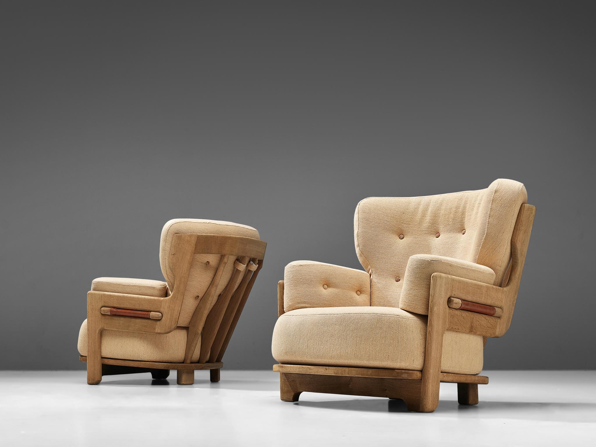 French Guillerme et Chambron Pair of 'Denis' Lounge Chairs in Oak