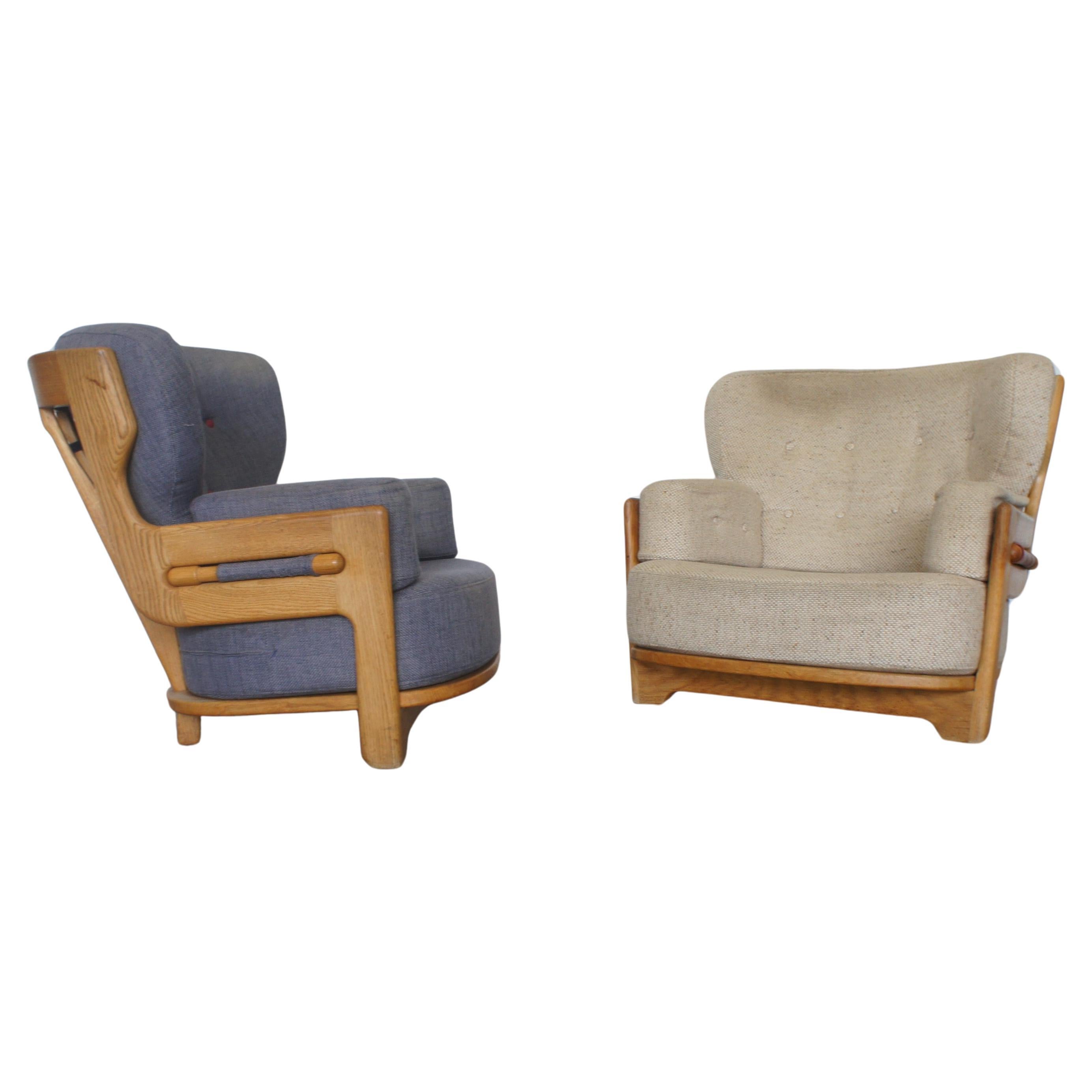 Guillerme et Chambron, paire de fauteuils Denis en chêne éditées par Votre Maison 1970 en vente