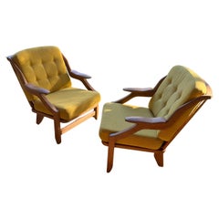 Guillerme et Chambron pair of Grégoire armchairs