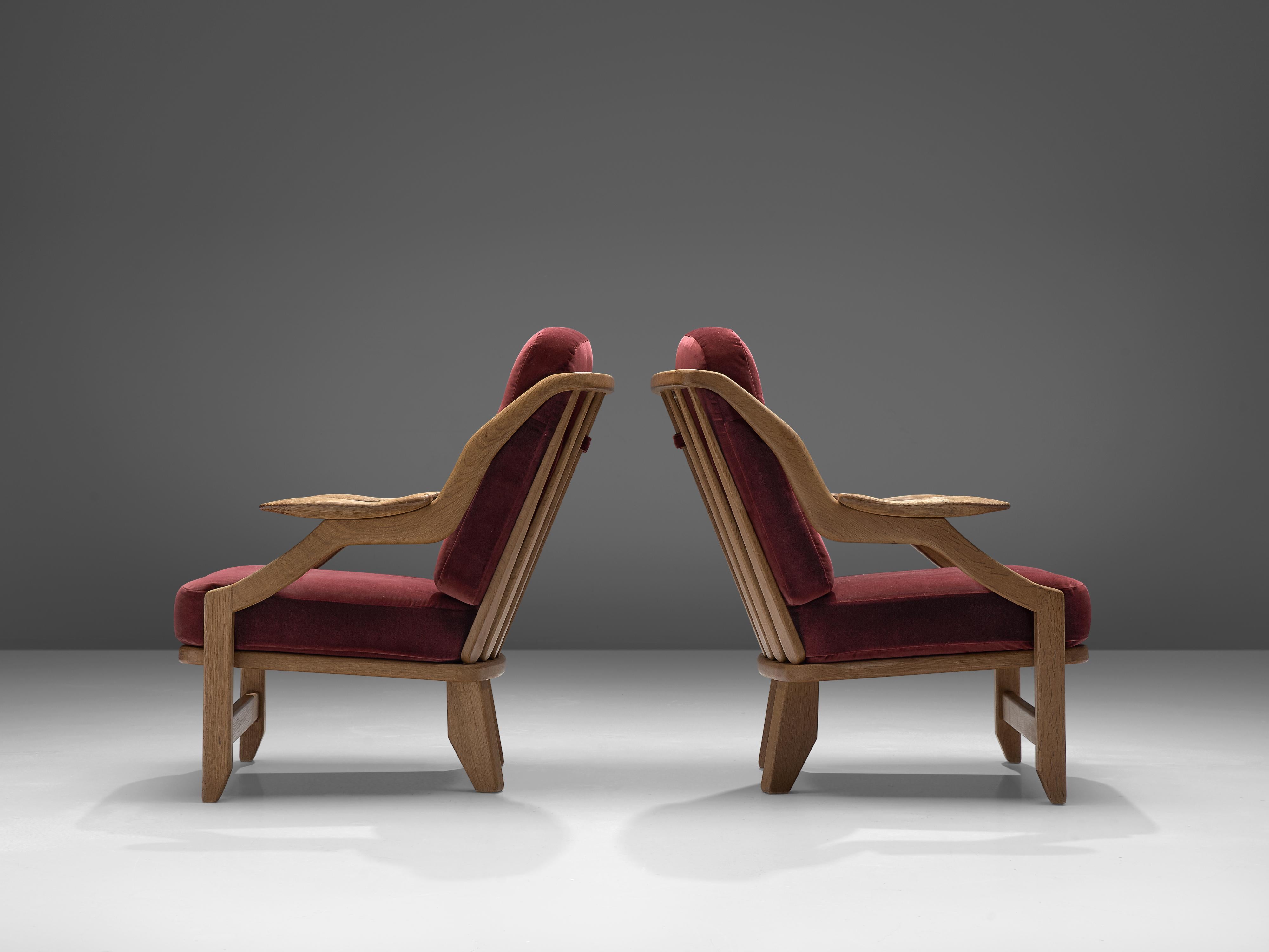Mid-20th Century Guillerme et Chambron Pair of 'Gregoire' Lounge Chairs in Burgundy Upholstery