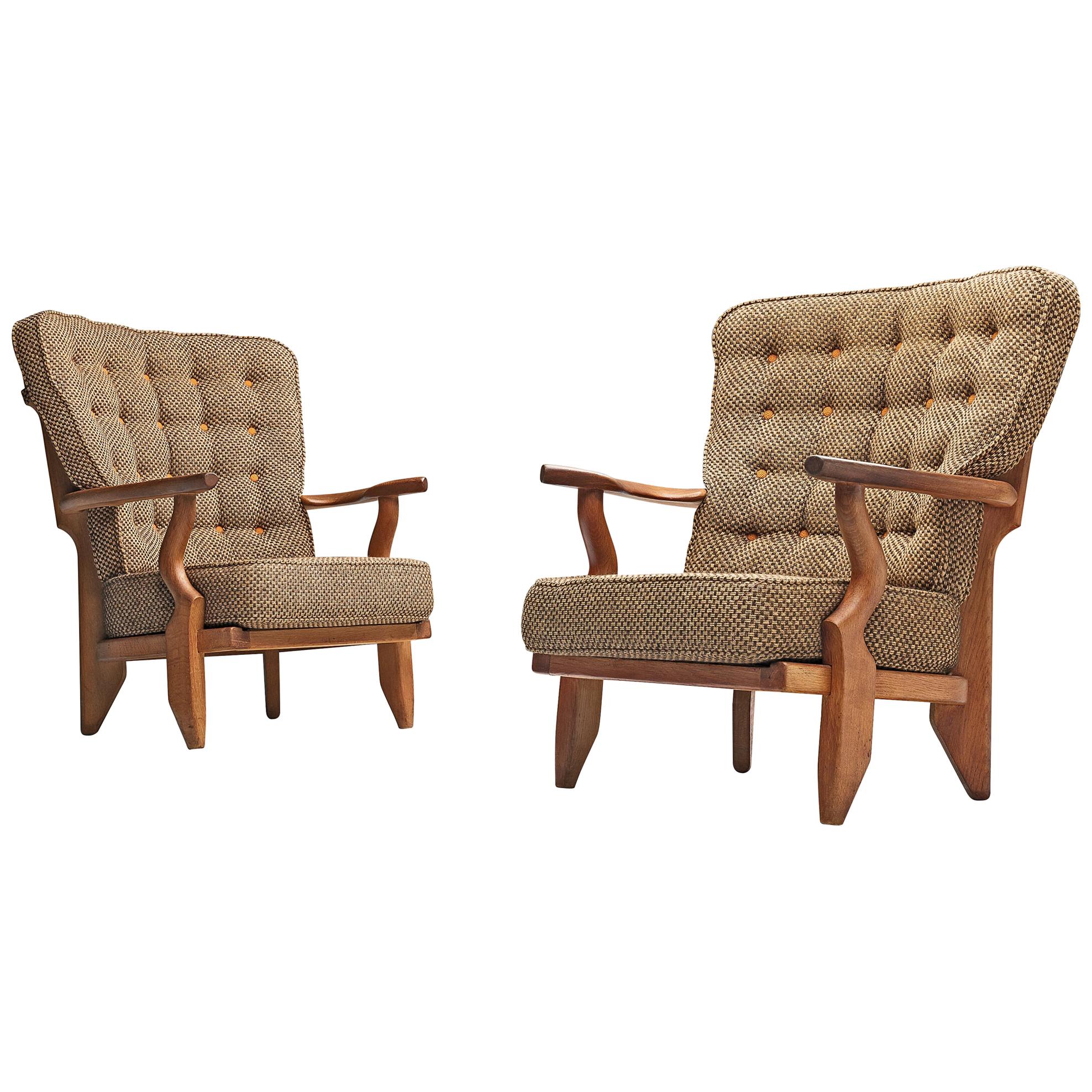 Guillerme et Chambron Pair of Lounge Chairs 'Caqueteuse' in Oak