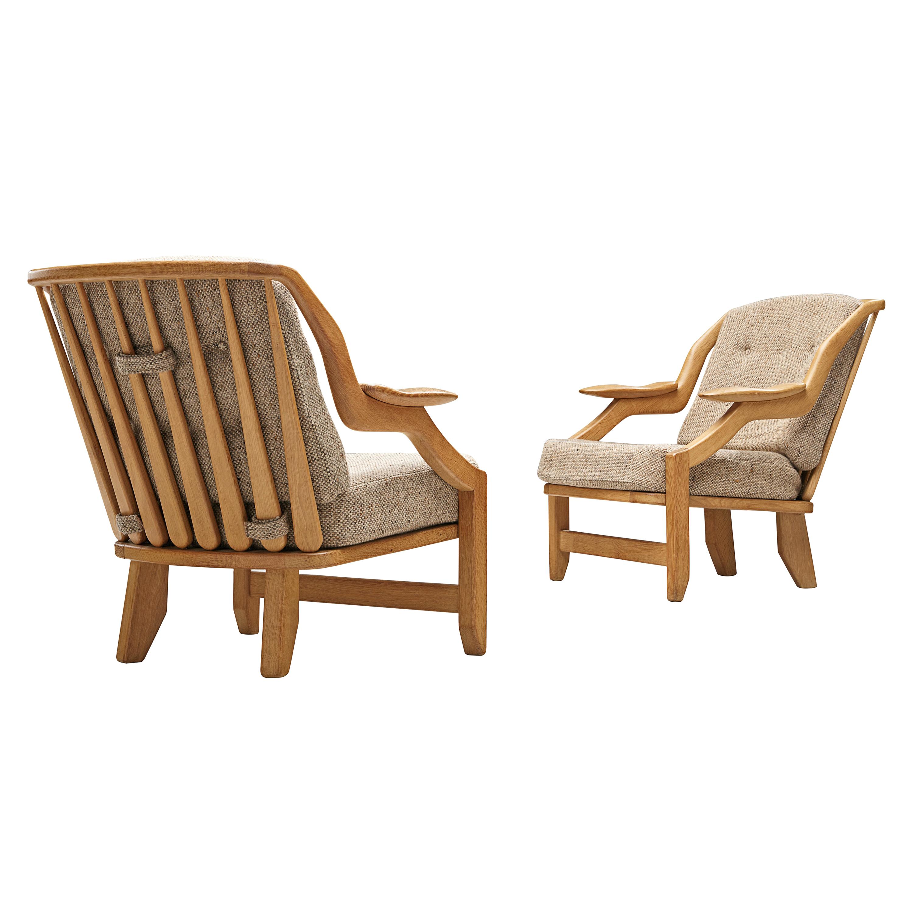 Guillerme et Chambron Pair of Lounge Chairs in Oak