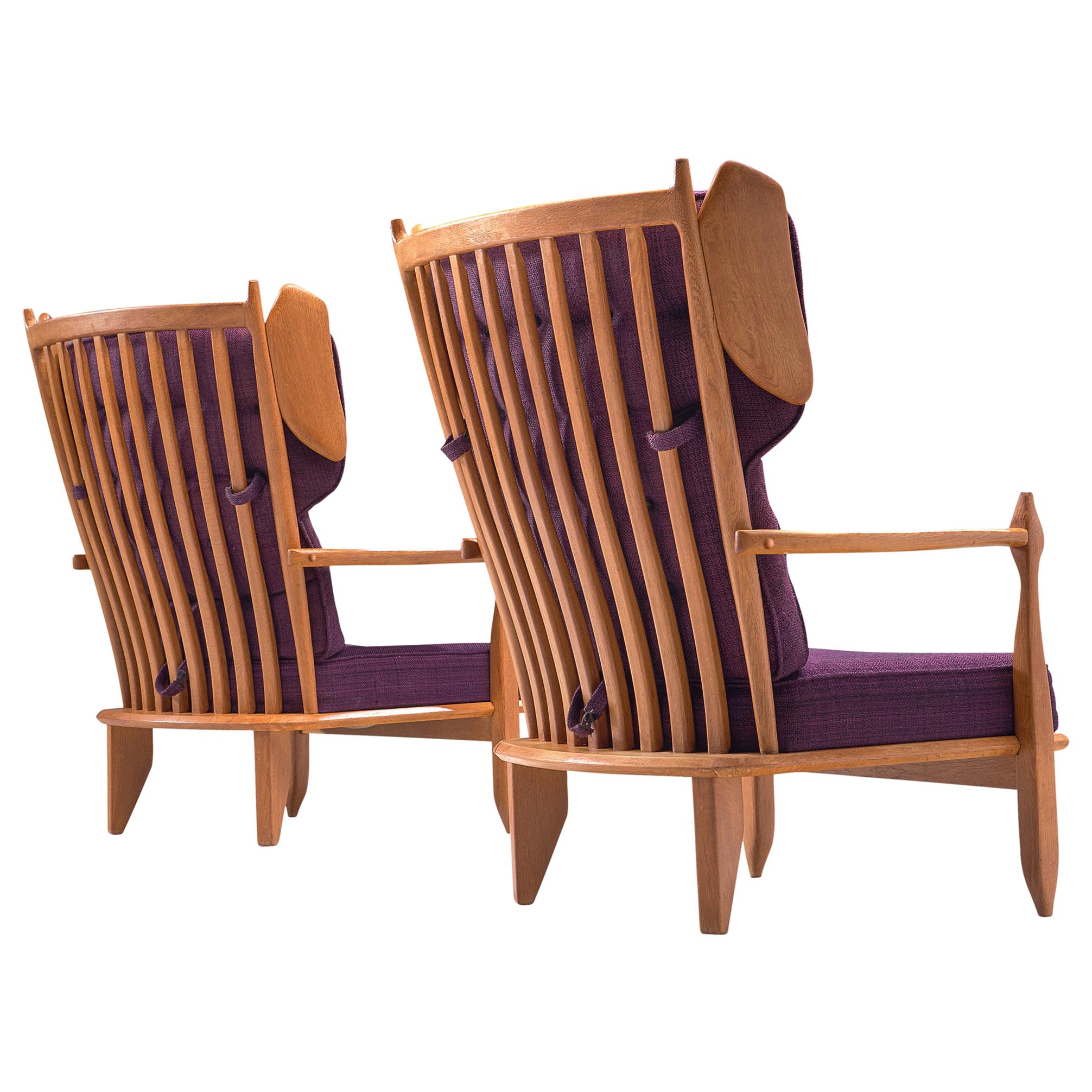 Guillerme et Chambron Pair of Wingback Lounge Chairs in Oak