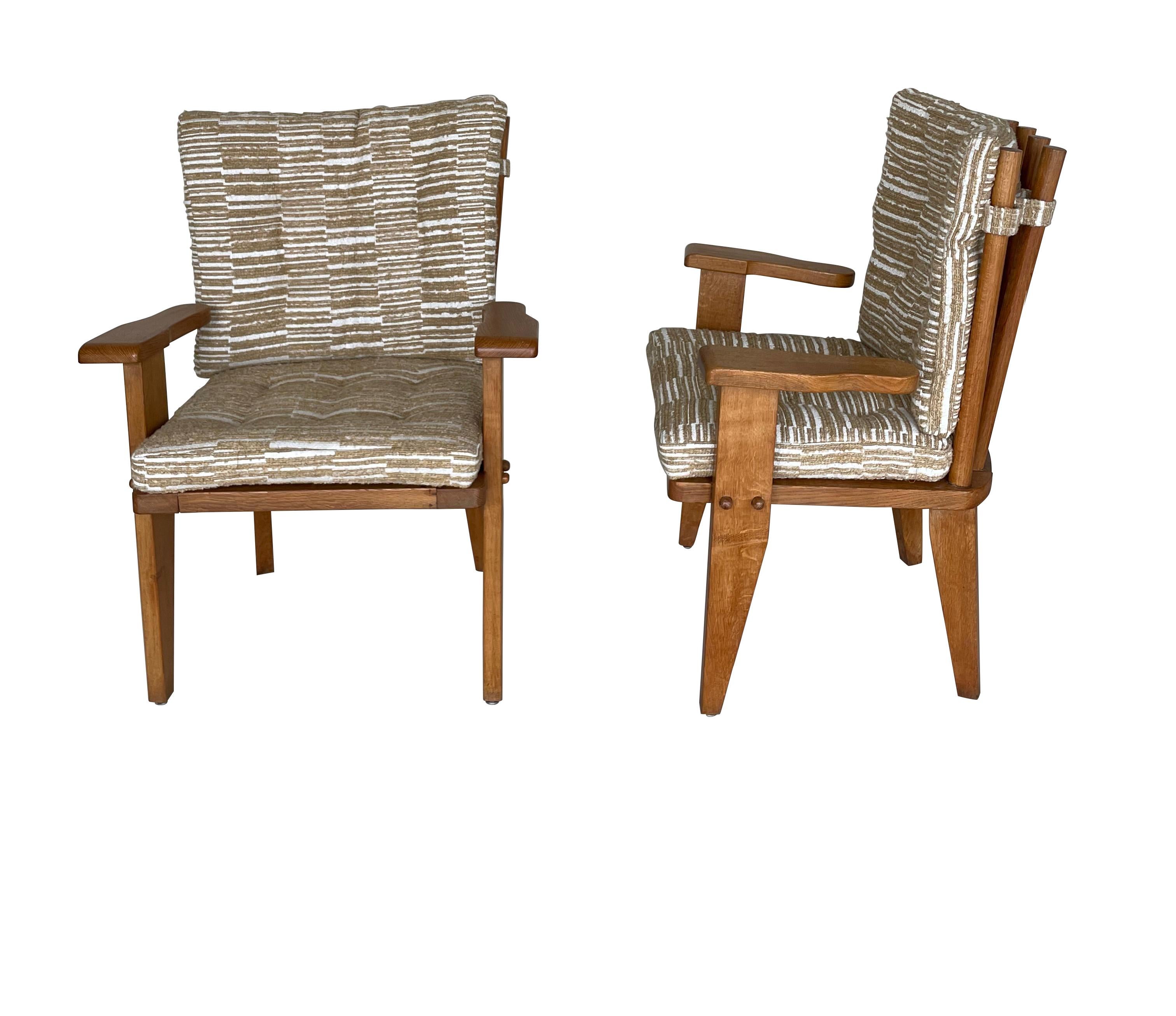 1960's French pair of Guillerme et Chambron side chairs.
Signature spindle back design.
Angular shaped legs. 
Open ended arms.
Wood stud detail.
Newly reupholstered.
ARRIVING AUGUST