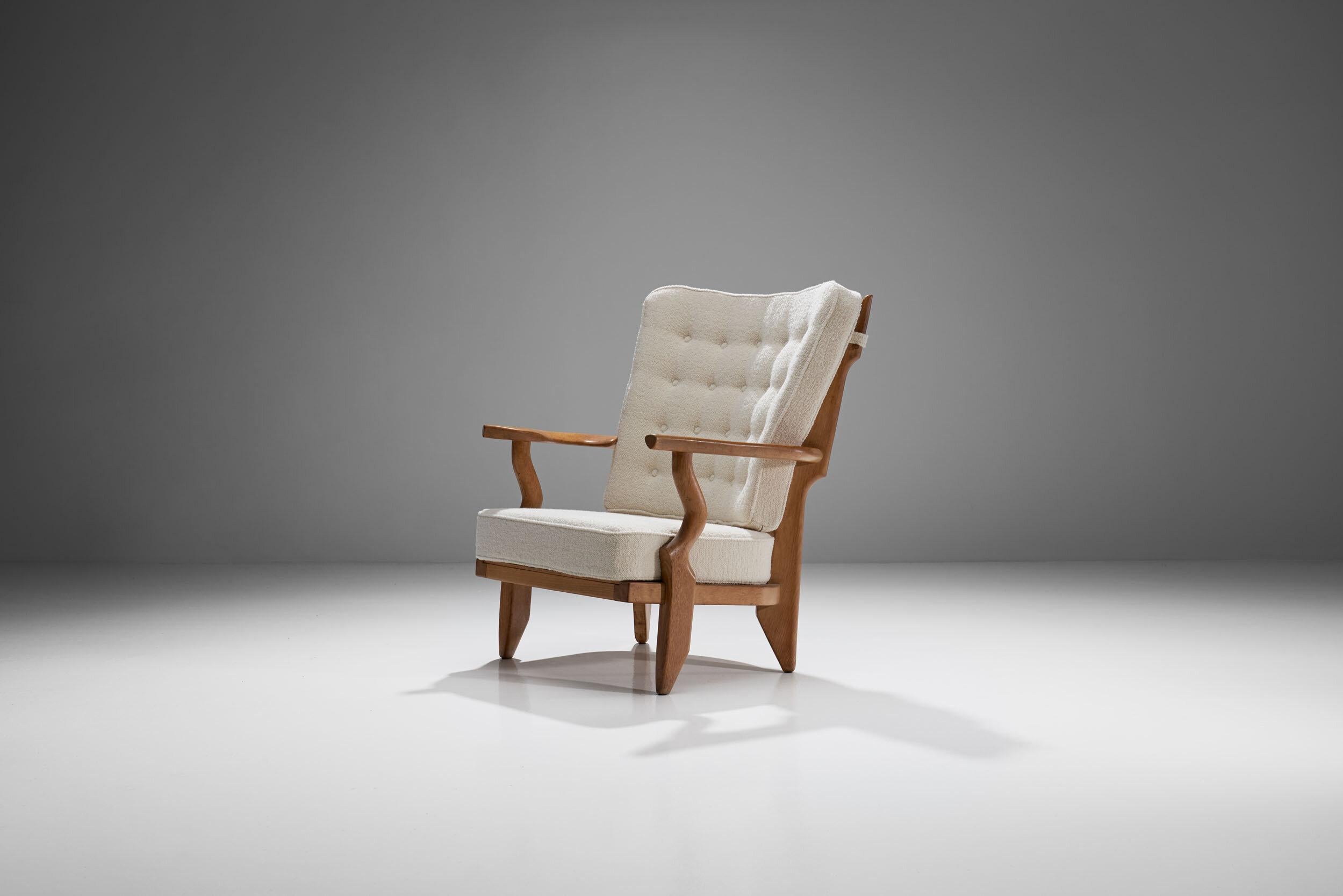 Guillerme et Chambron “Petit Repos” lounge chair, France, 1950s

The Guillerme et Chambron Petit Repos lounge chair displays a beautiful contrast between the light wooden oak frame and the elegant light fabric of the cushions. With a solid wooden