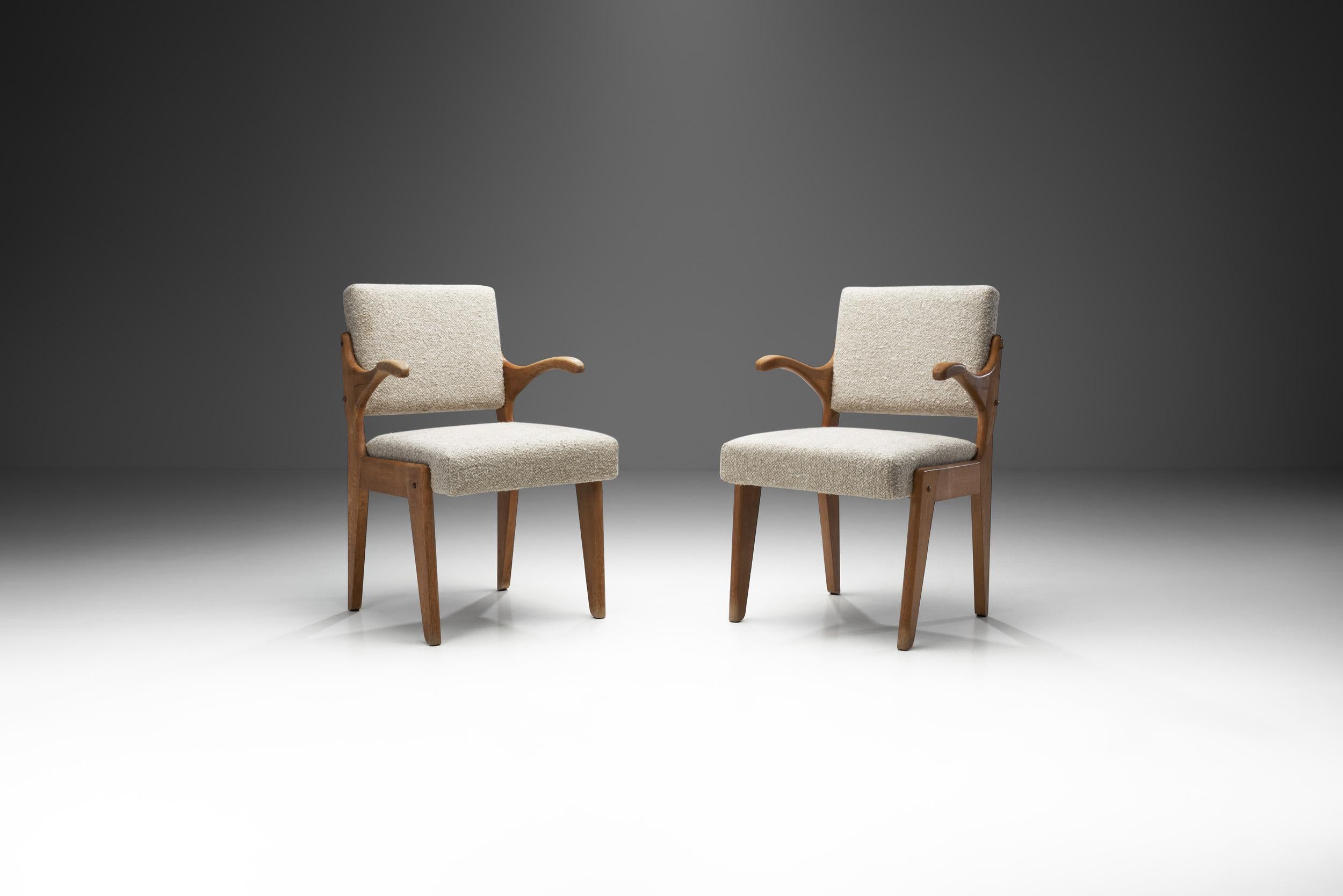 This rare pair of armchairs is among the rarest chair models of the French designers. “Fauteuil bridge” or bridge chairs from France are generally lightweight chairs, often part of a set of matching chairs and bridge table. Bridge chairs were