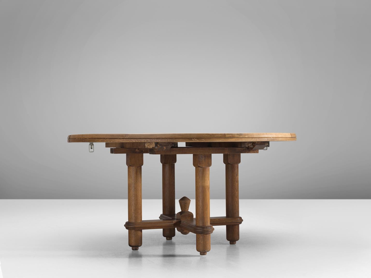 Guillerme et Chambron for Votre Maison, table 'Victorine', in oak, France 1970.

This wonderful table shows great craftsmanship and a strong appearance, that clearly characterizes the work of Guillerme & Chambron. The top of the table has beautiful