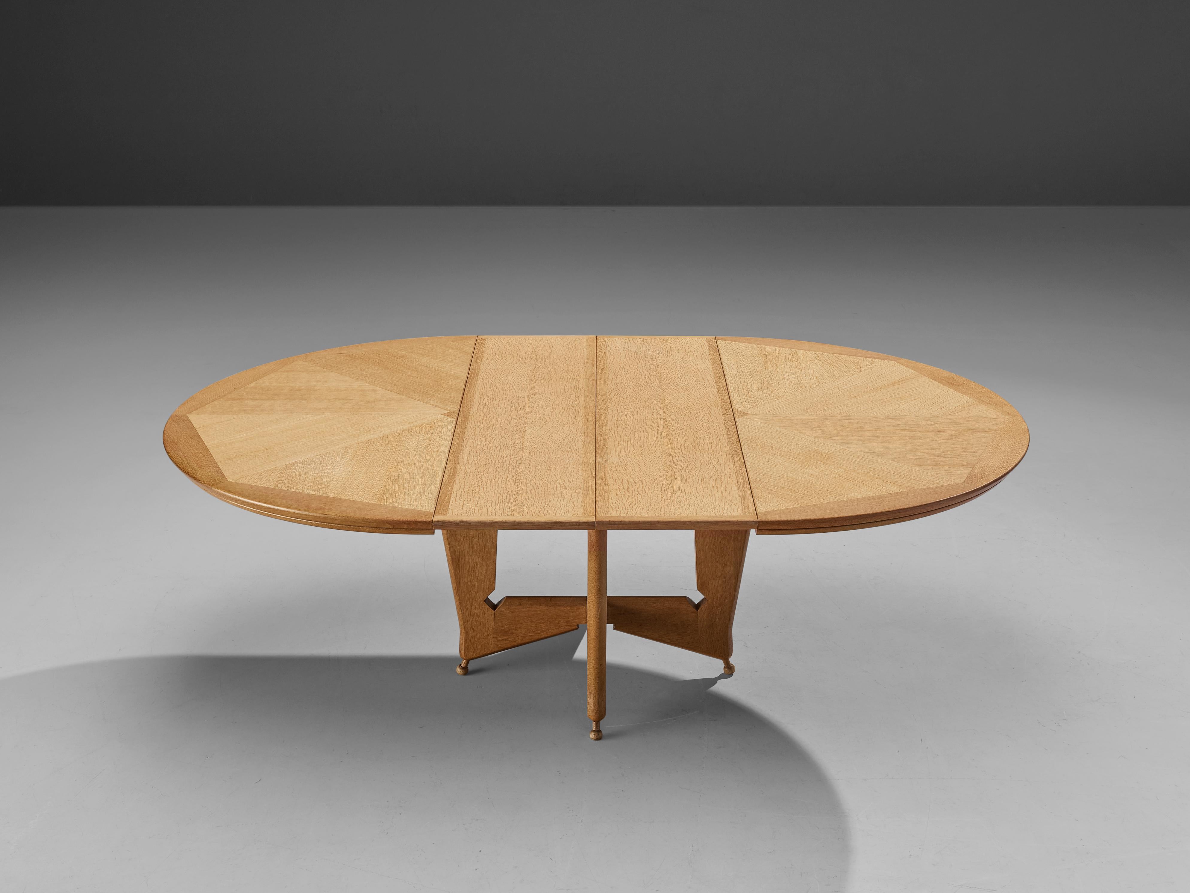 Mid-20th Century Rare Guillerme et Chambron Round Dining Table in Oak, W 58 inch. 