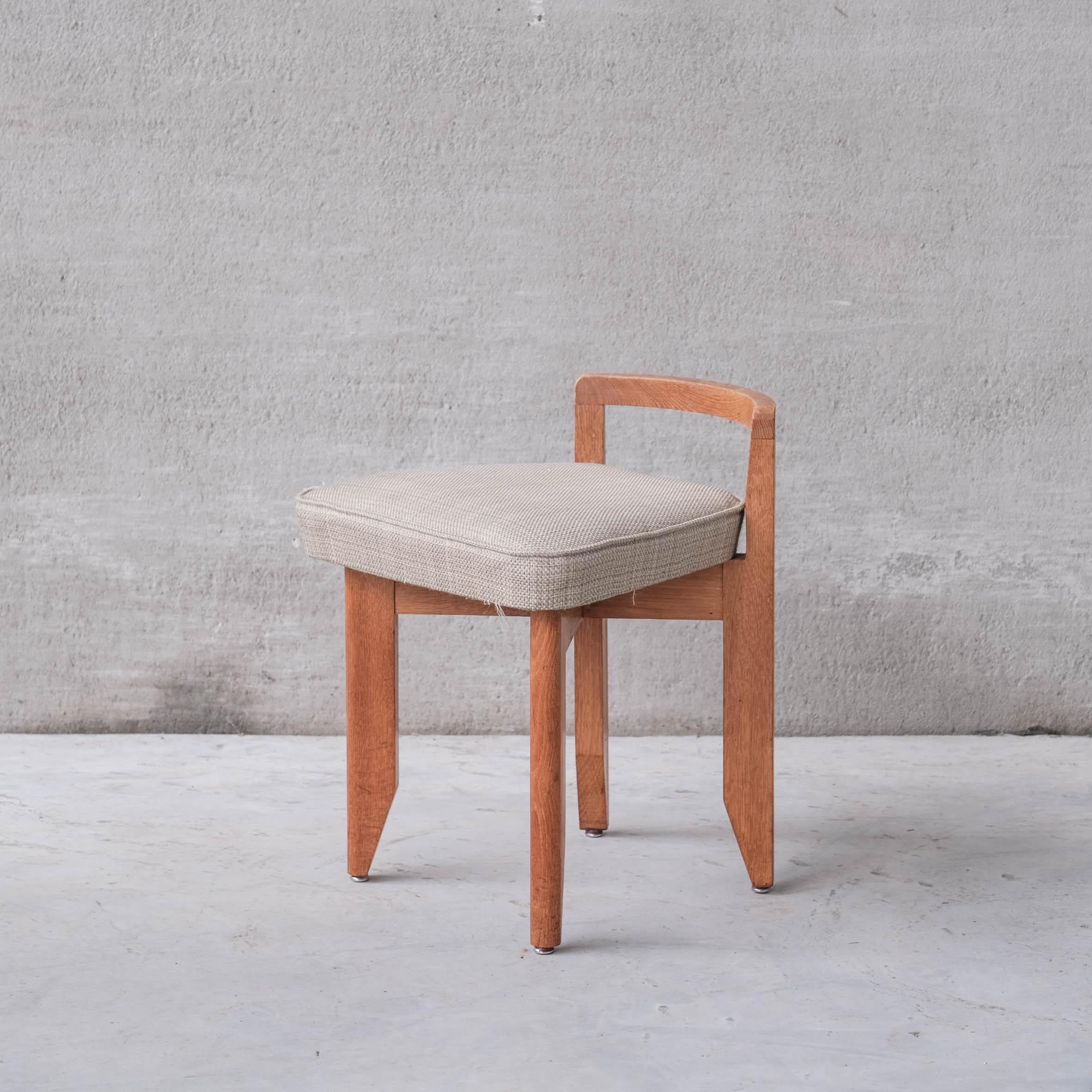A rare stool by Guillerme et Chambron.

France, c1960s.

A scarce model.

Oak, professionally re-upholstered in quality Alpaca.

Original model, not a later reproduction.

PRICED INDIVIDUALLY. 


