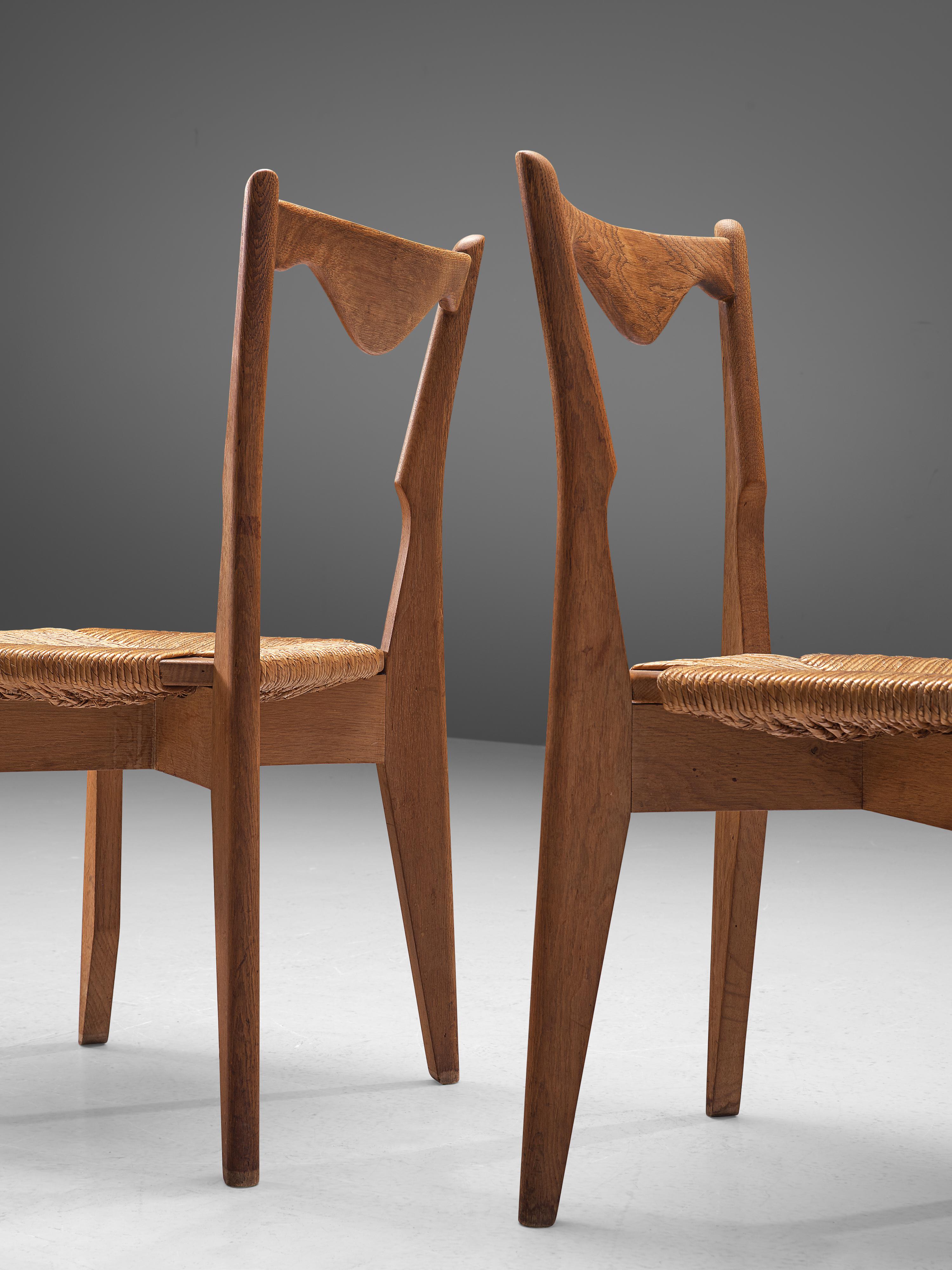 Mid-Century Modern Guillerme et Chambron Set of 10 Dining Chairs in Oak and Straw Seats