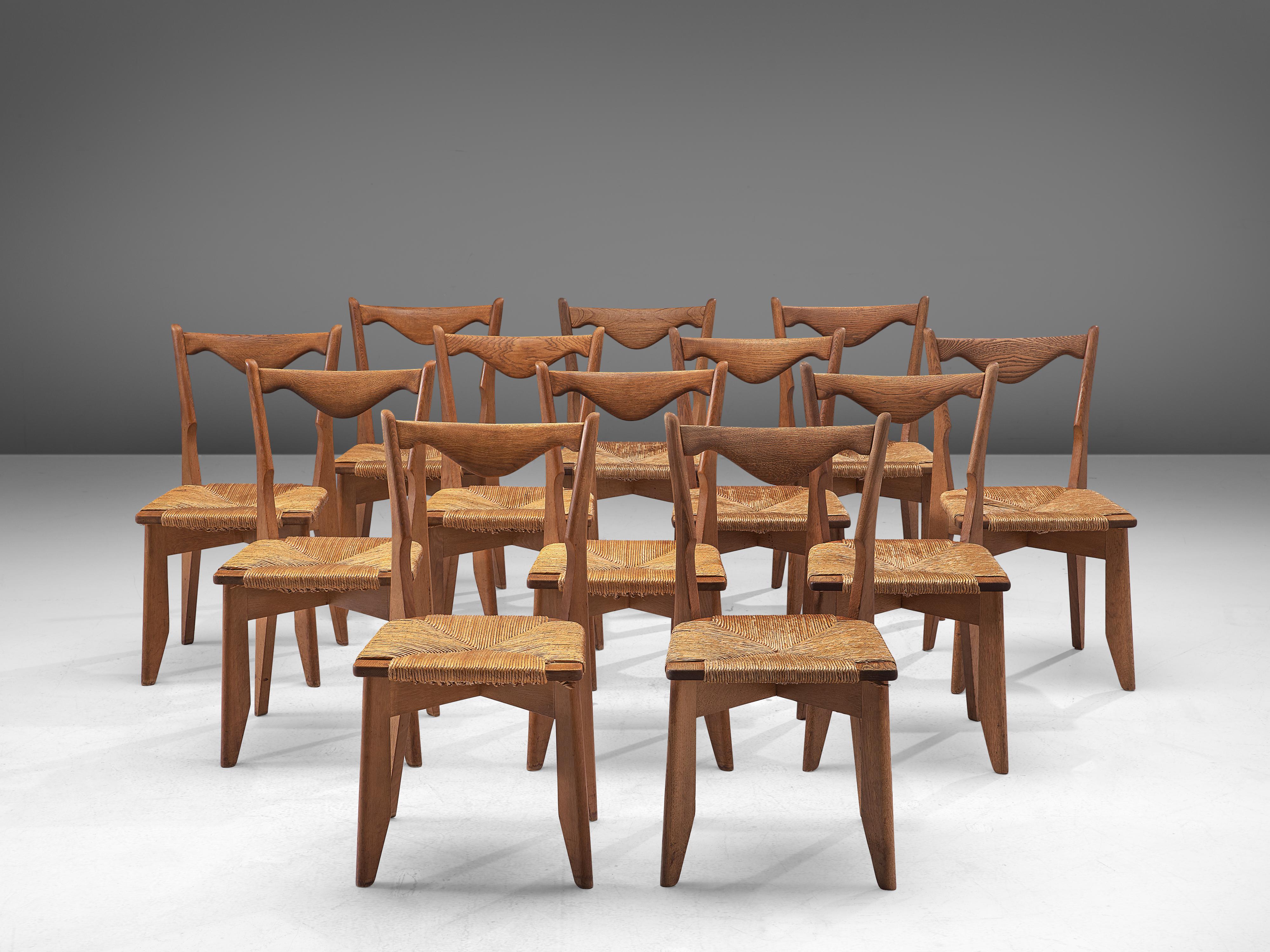 French Guillerme et Chambron Set of 10 Dining Chairs in Oak and Straw Seats