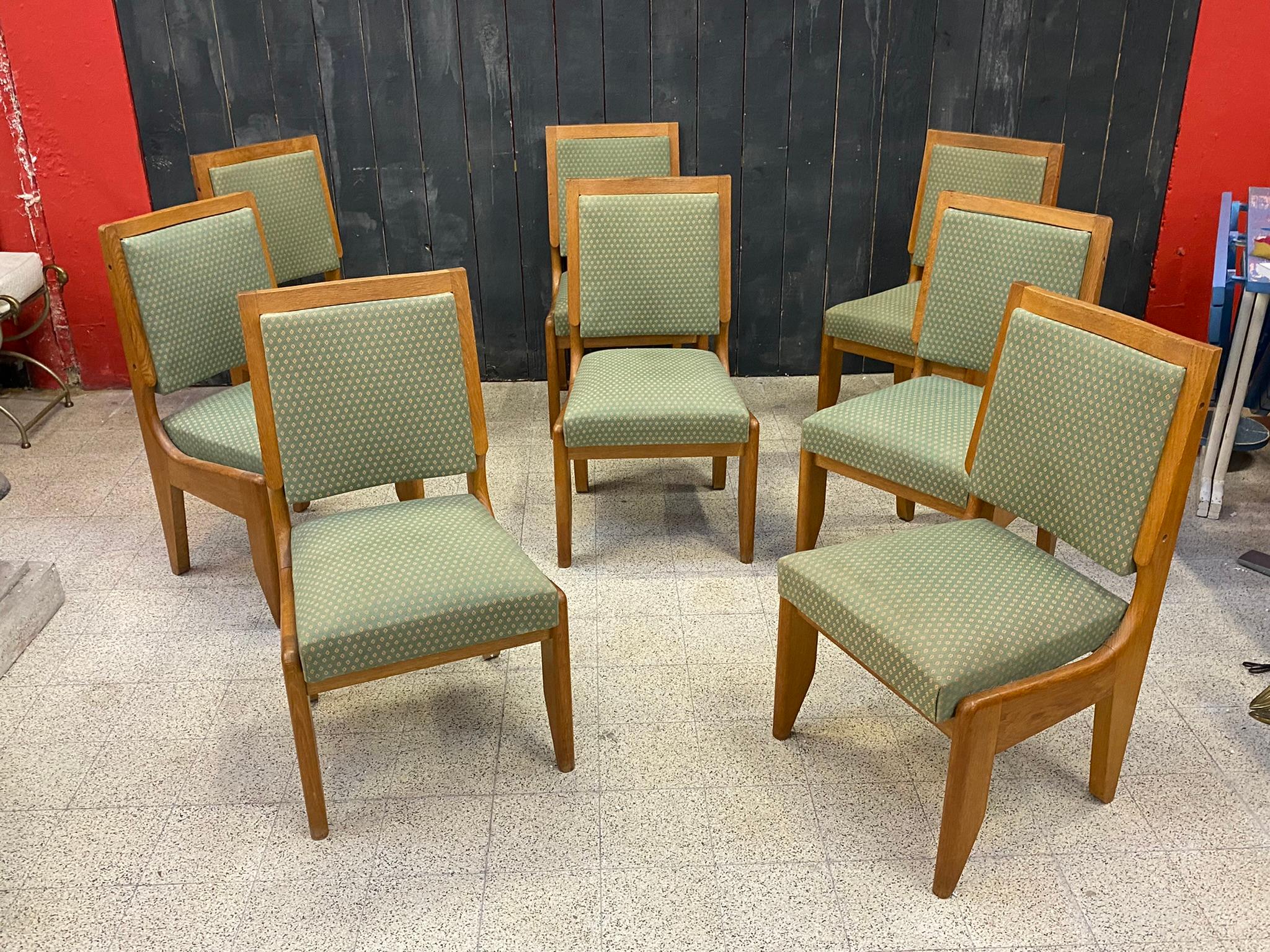 Guillerme et Chambron, set of eight oak chairs. Edition Votre Maison, circa 1970.
the fabric is in good condition
the small wooden screw covers are missing.
 