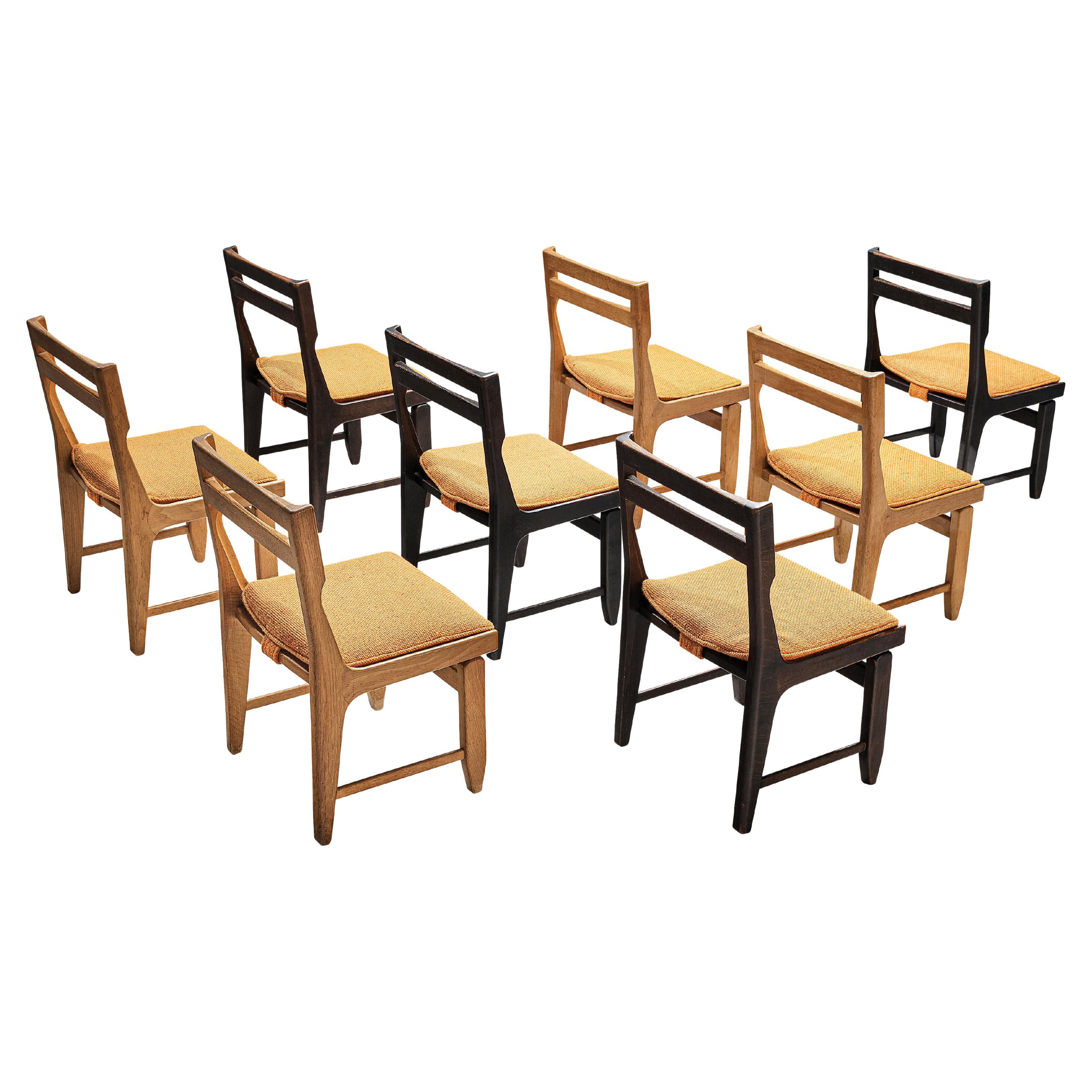 Guillerme et Chambron Set of Eight Bicolor Dining Chairs in Oak