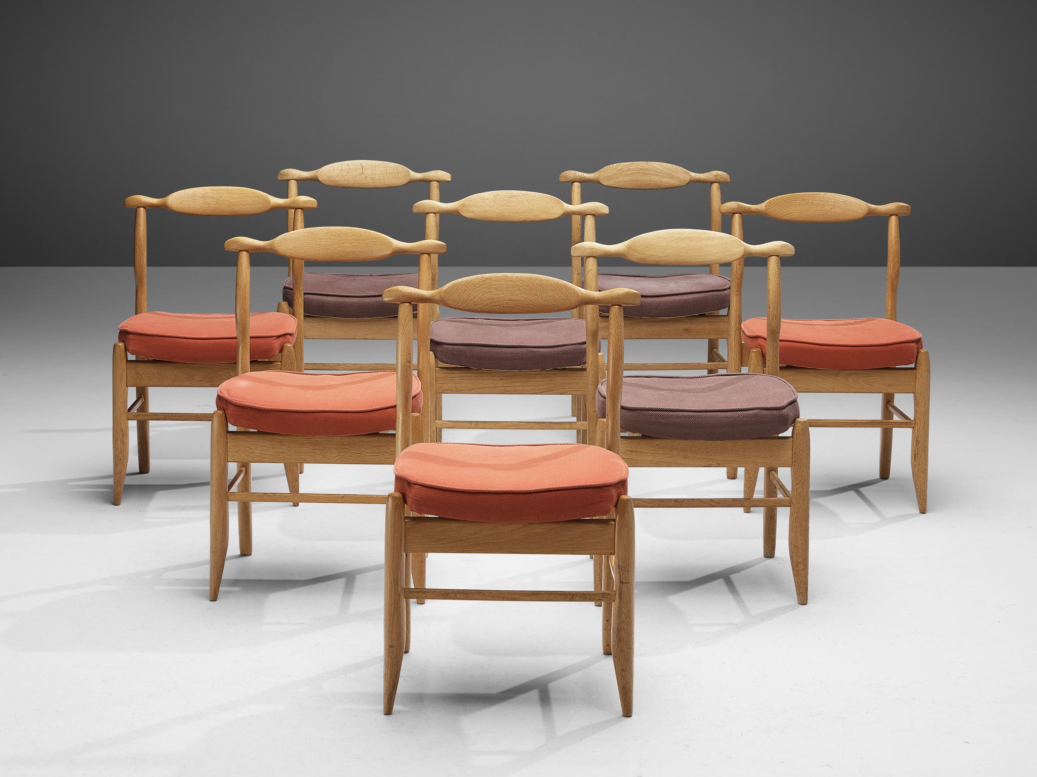 Guillerme et Chambron, set of eight dining chairs model 'Fumay', oak, fabric, France, 1960s

Beautifully shaped chairs in patinated oak by French designer duo Jacques Chambron and Robert Guillerme. These dining chairs show beautiful lines in every