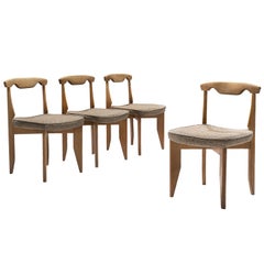 Guillerme et Chambron Set of Four Dining Chairs with Beige Upholstery