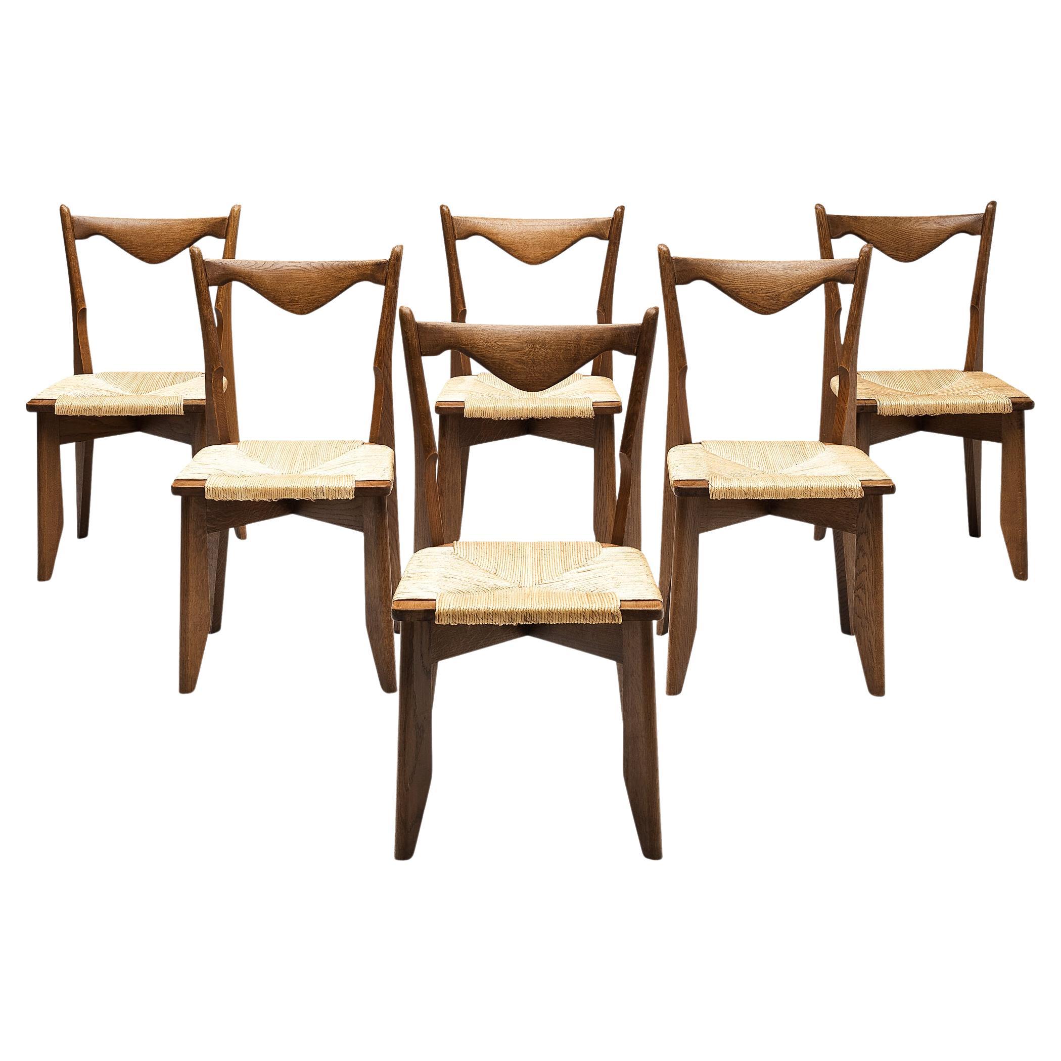 Guillerme et Chambron Set of Six Dining Chairs in Oak and Straw Seats
